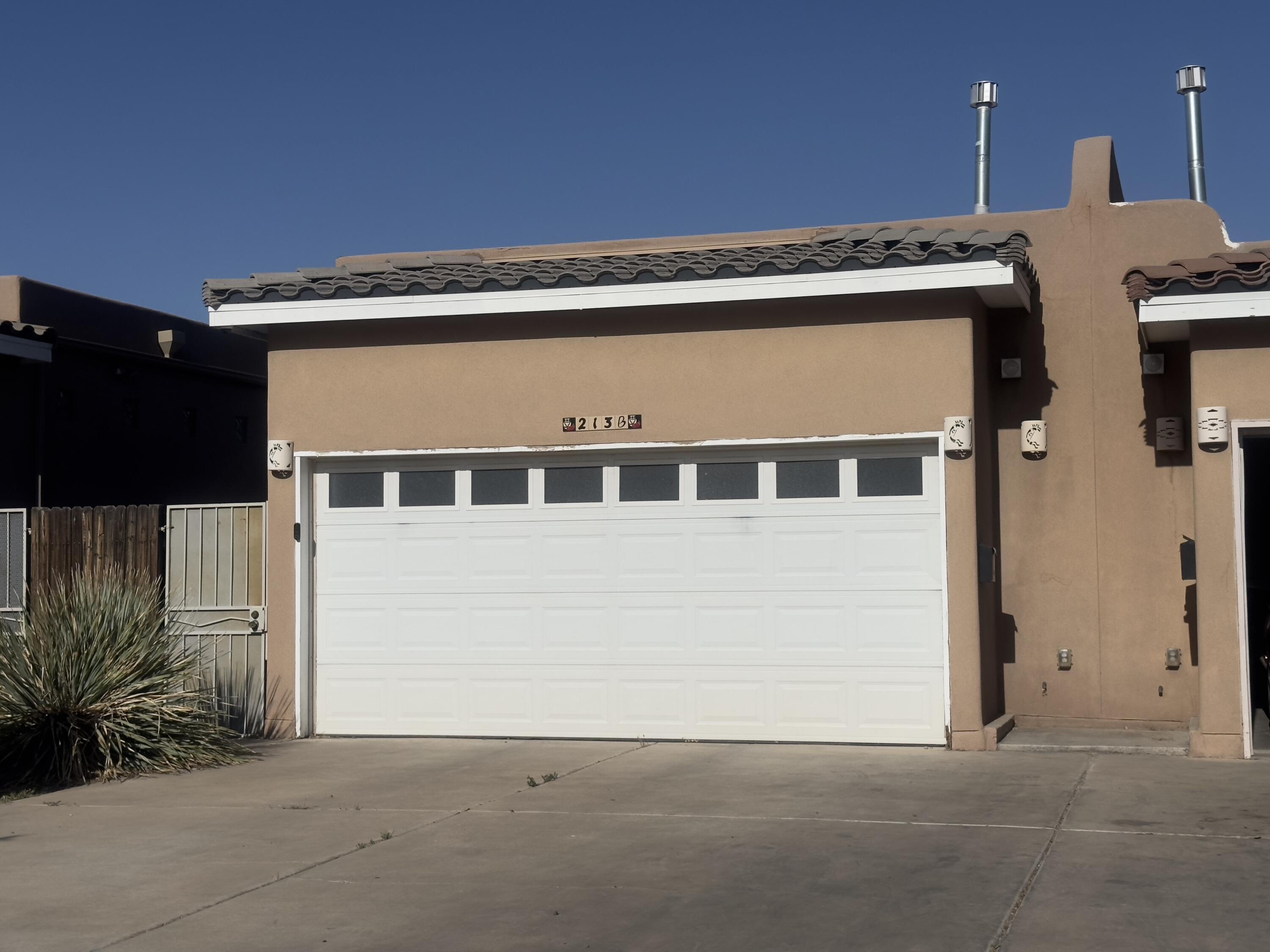 ***VA assumable loan at 3.5%*** Welcome to this charming single-story townhome located just minutes from UNM, Nob Hill, and all the dining, shopping, and culture Albuquerque has to offer! Step inside to find a warm, two-tone interior, a cozy fireplace, tile flooring throughout the main areas, and carpet in the bedrooms.  Designed with both comfort and functionality in mind, this home features 3 spacious bedrooms--with private vanities and separate entrances, making it a perfect setup for roommates or extended guests.  This location is tough to beat and offers great potential for long-term or short-term rental income.Whether you're a first-time buyer, savvy investor, or someone seeking a low-maintenance home near the heart of the city--this is a must see!