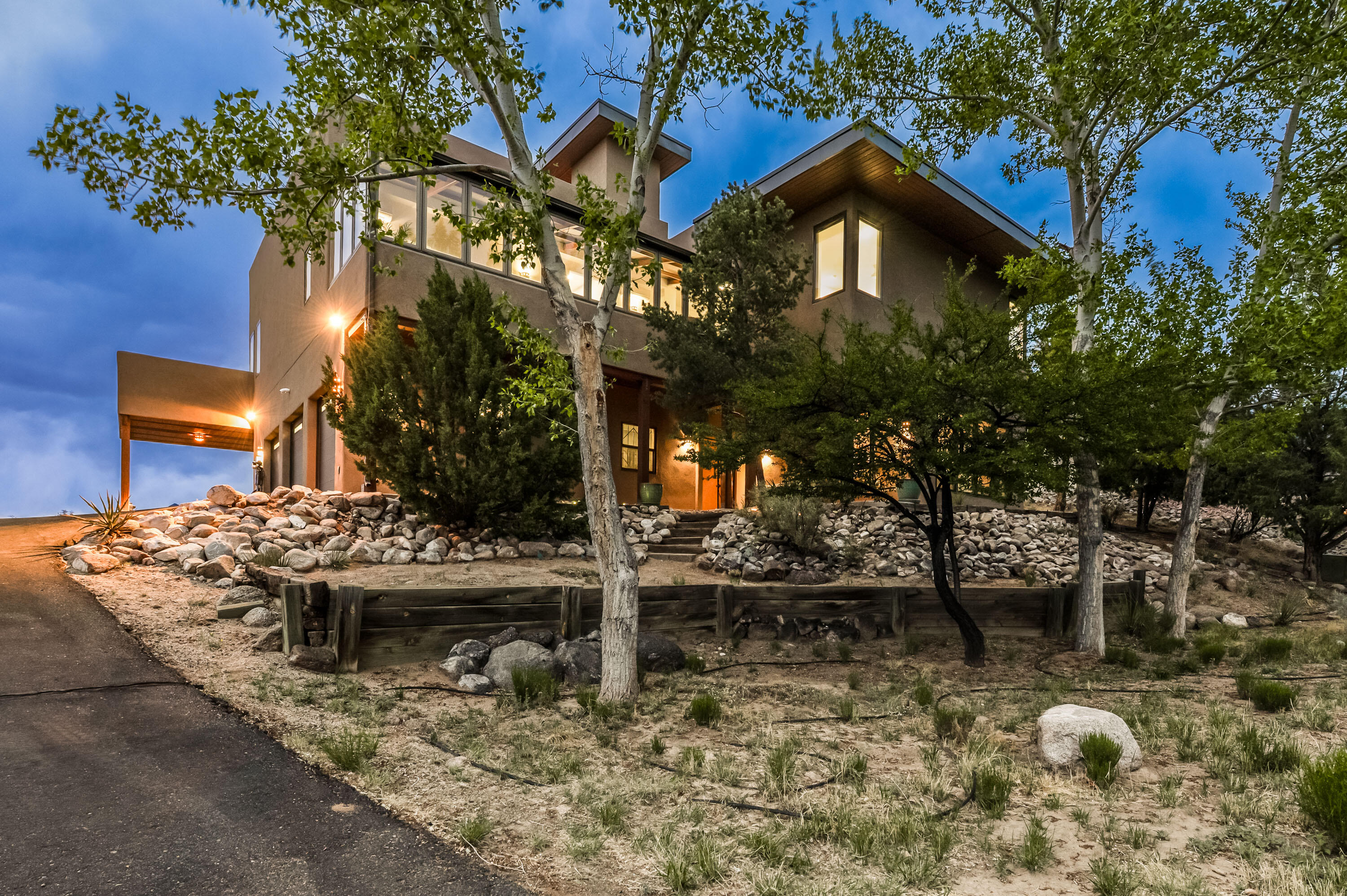 Open house 5/10 1pm to 3pm SANDIA HEIGHTS! Astounding viewsfrom the ground to the rooftop deck of the surrounding mountains. One minute accessto the National Forest where you can hike, bike and commune with nature. Aremodeled home with 3 generous bedrooms and 3.5 baths. Home built to providecomfort, function and enjoyment with an abundance of natural light. New tile floors,bright walls and upgraded function and comfort. New since 2018 - 3 stop ELEVATOR that holds 4, running top to bottom essentially transforming this into a one story home!TPO roof/metal roof, synthetic stucco, septic system, garage doors, HVAC system andmini-splits, EV charging station, tankless water heater, recirculating hot water system,porcelain paver decks and upstairs laundry hookups.