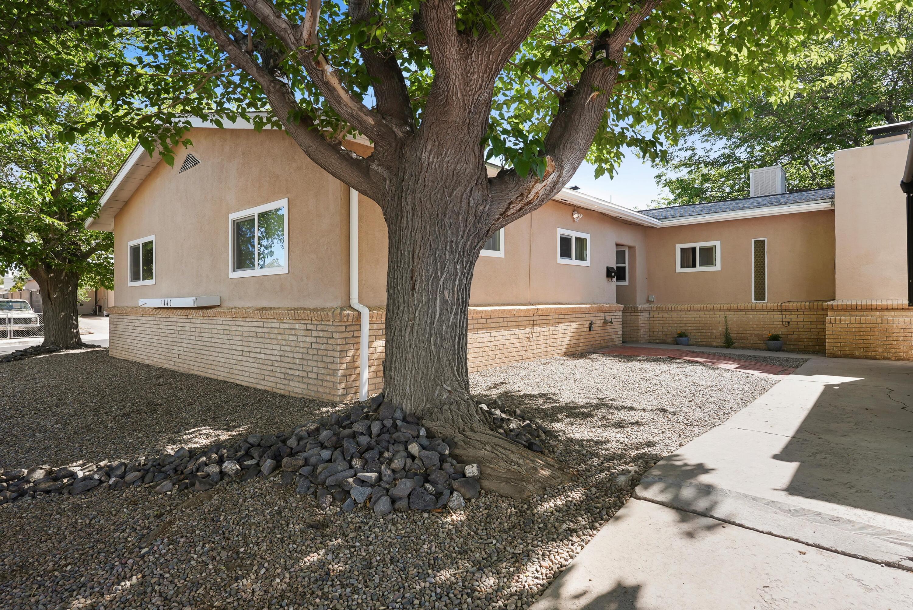 Don't miss this beautifully updated home featuring two spacious living areas (den with wet bar ideal for a game room or second living space) & two fireplaces. The kitchen boasts new Stainless Steel appliances and Silestone solid surface countertops. You'll love the new flooring throughout the main areas, remodeled bathrooms, and all new windows. This home is truly move-in ready. The backyard includes new grass, a storage shed, mountain views, and an east-facing covered patio so cool and inviting on those warm summer days & evenings! So much more to see - so come on over!