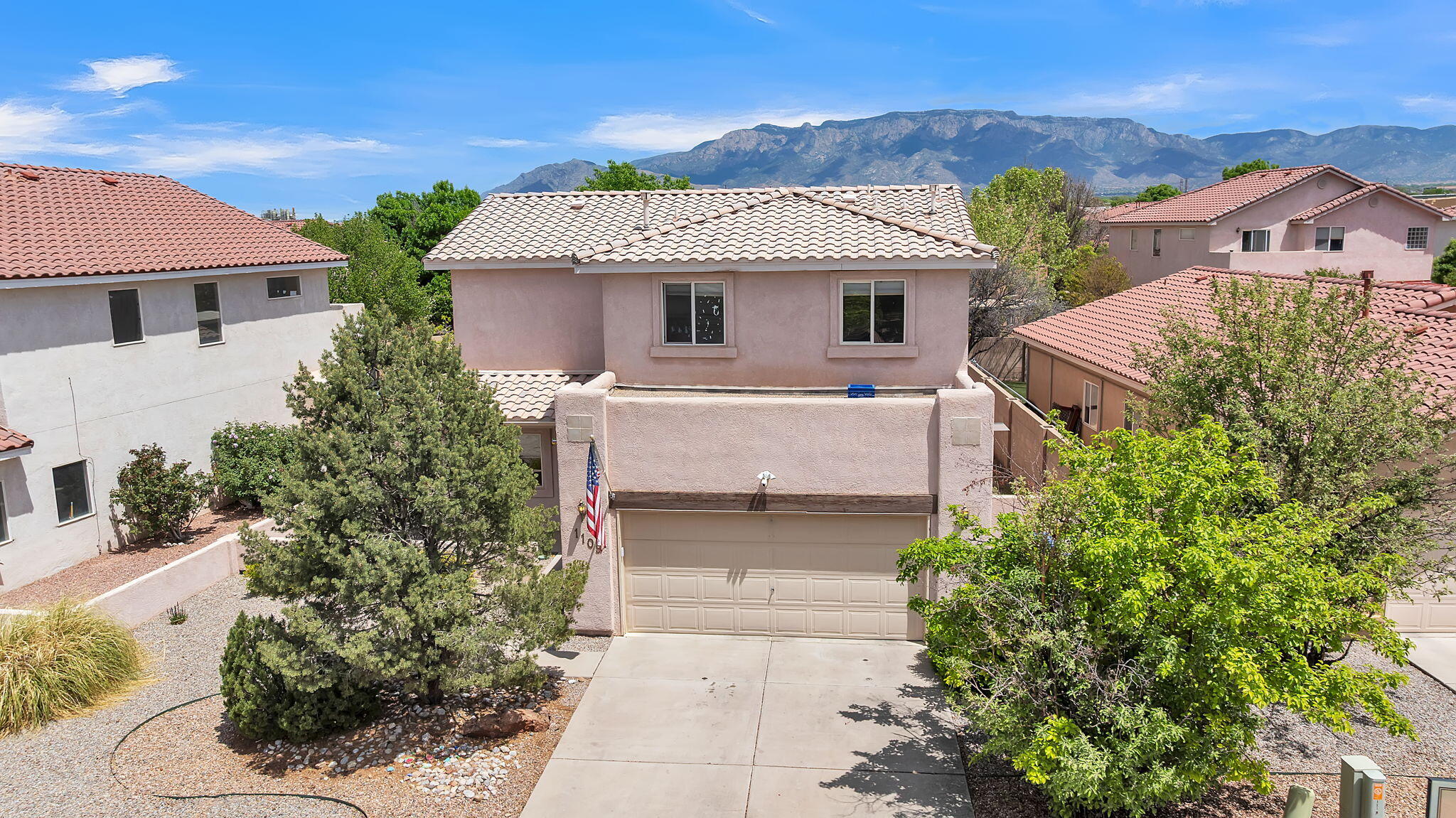 4-Bedroom Home in Vista del Norte with Balloon Fiesta ViewsThis well-appointed two-story home in Albuquerque's Vista del Norte neighborhood offers 4 bedrooms, 2.5 bathrooms, and a thoughtfully designed layout suited for comfortable living and entertaining.Located just minutes from Balloon Fiesta Park, the property offers exceptional views as balloons drift overhead each fall during Albuquerque's iconic International Balloon Fiesta. The backyard also captures the beauty of the Sandia Mountains, creating a stunning backdrop year-round.Inside, the home features spacious living areas, a functional kitchen, and a private primary suite. Natural light, high ceilings, and a practical floor plan enhance the overall sense of space and ease.
