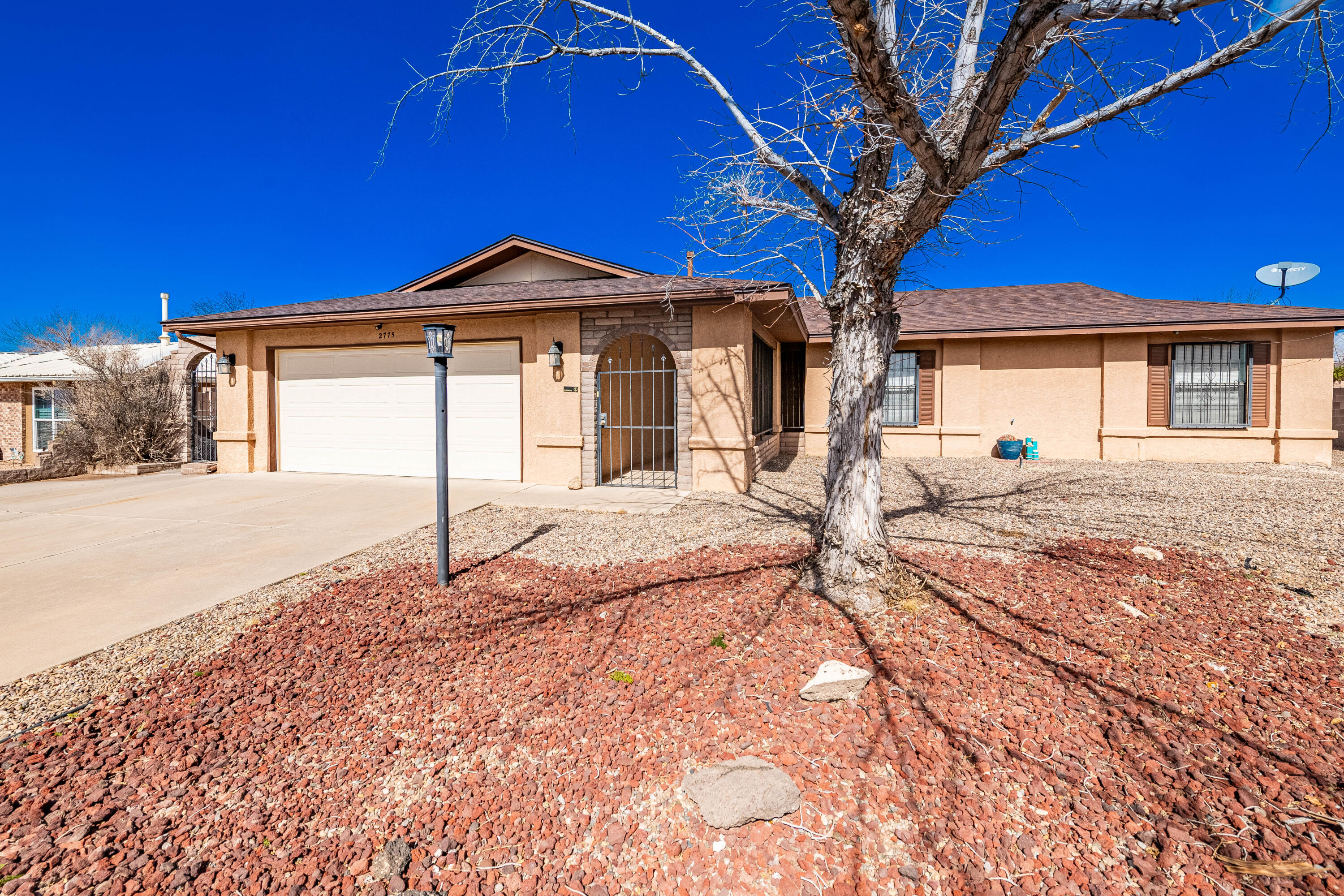 Charming Single-Story on One of the Largest Lots in the Neighborhood!This beautifully maintained 3-bedroom, 2-bath home sits on a massive .46-acre lot--possibly the largest on the block--offering backyard access and ample space for your toys, trailers, or custom outdoor retreat. Inside, the home features a cozy fireplace, a well-designed floor plan, and an inviting kitchen with attractive countertops, a stylish backsplash, and all appliances included. Enjoy year-round comfort in the sunroom and added security with a gated front entry. Combining comfort, functionality, and an exceptional lot size, this home is a rare find you won't want to miss!