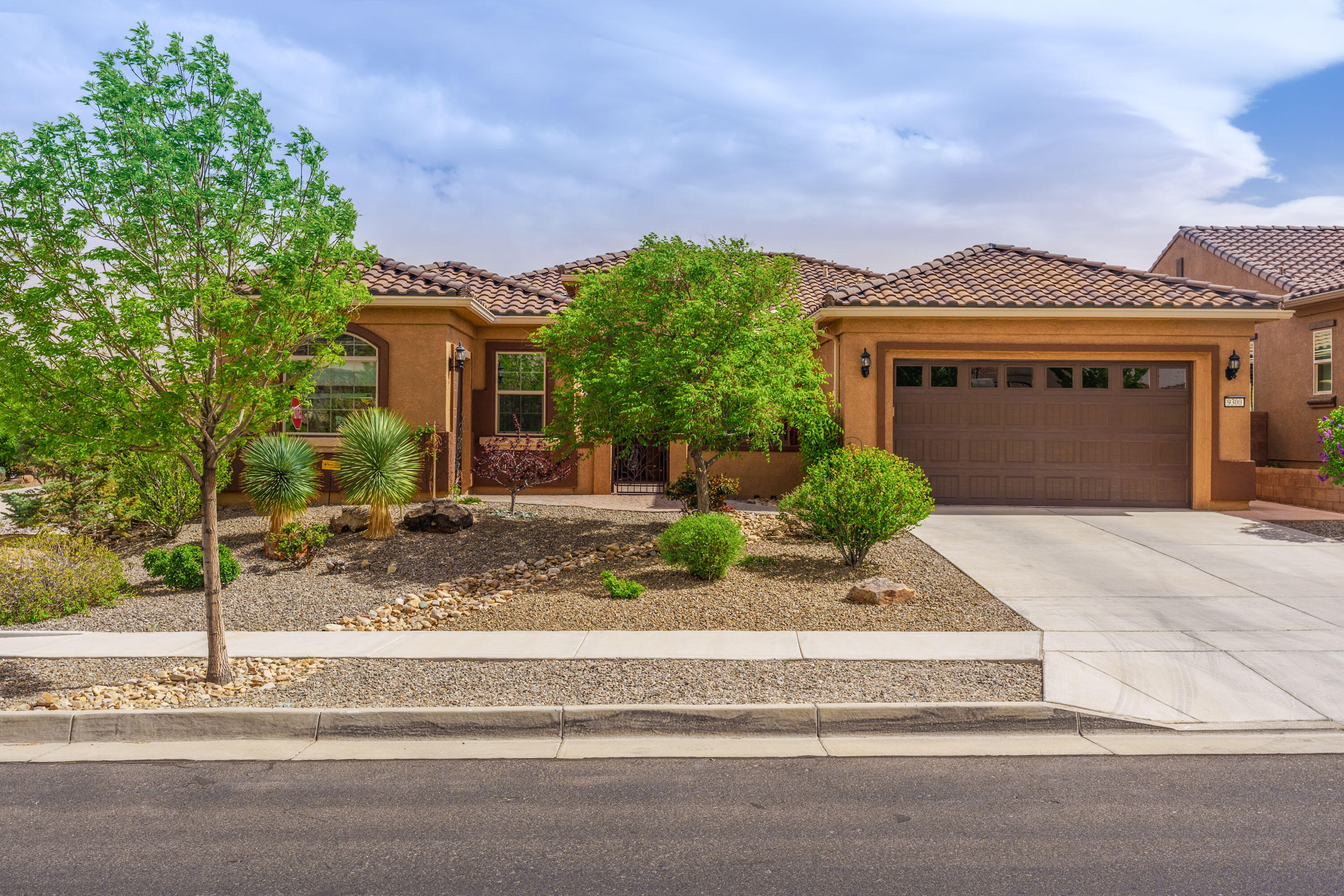 Gorgeous Home Located in Del Webb Mirehaven, a 55+ Active Gated Community! Home sits on a Large Premium Corner Lot w/views of the Sandia's from the East Windows of the home & East end of the backyard! Upgrades include Custom Paint & Lighting & Window Coverings, Multi Panel Sliding Glass Door, Bowed Wall in PB & Nook, Large Interior Storage Room, Raised Dishwasher, Extended Wall of Cabinets w/Granite off Kitchen, Pull Outs, Surround Sound w/5 Speakers, Addn'l Recessed Lighting, 2 Primary Suites, Office w/Custom Built-in Desk & Bookshelves, Oversized 2 Car Garage & Cart Garage that is Heated/Cooled Ideal for a workshop, etc!  Whole House Humidifier! Beautiful Backyard has Large Covered Patio, Heated Fiberglass Pool, Wonderful Gardens w/Roses & Perennials! Enjoy the Sandia Amenity Center!!