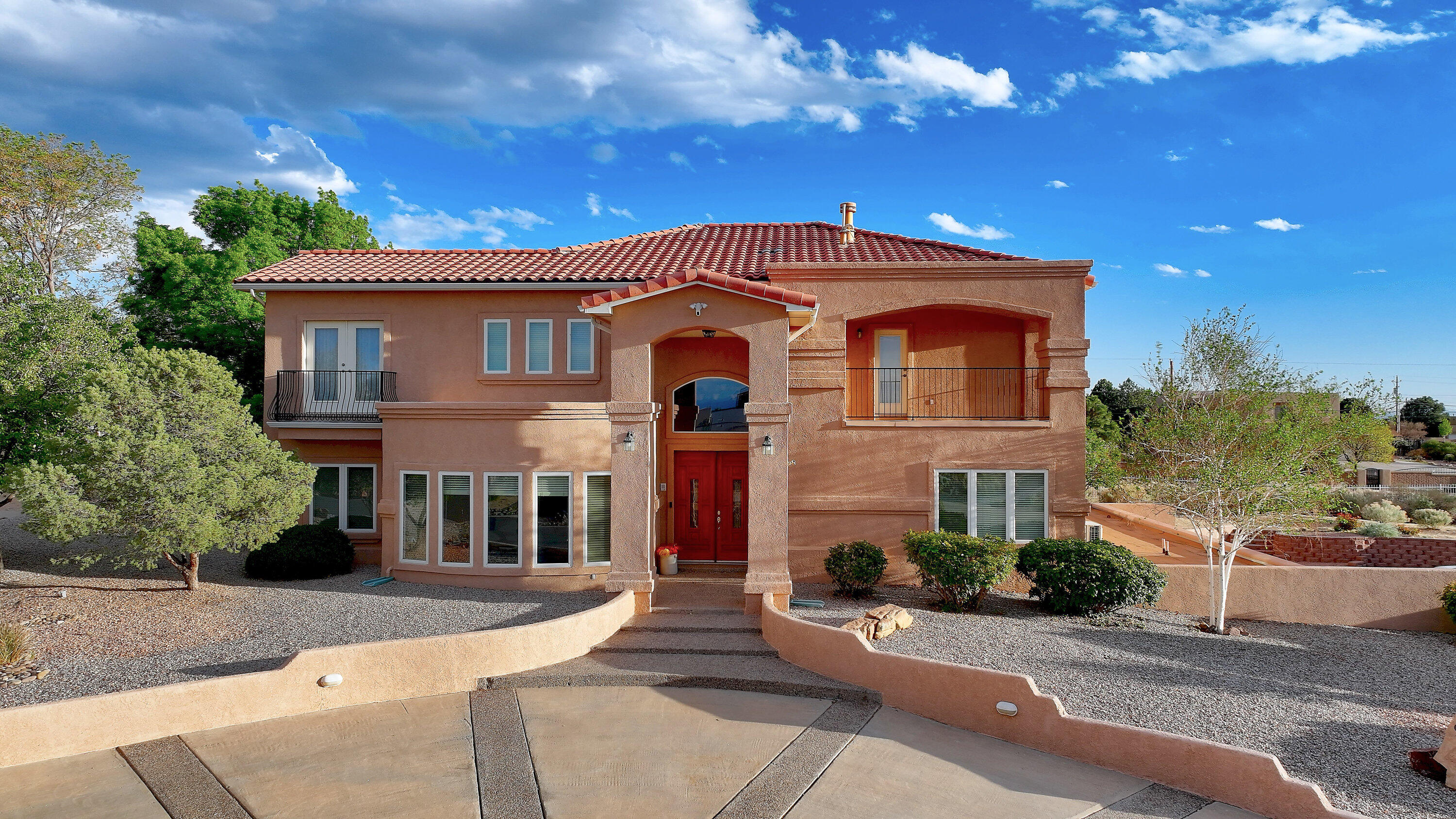 Luxurious home includes a casita with a separate entrance, kitchenette, and laundry--ideal for guests, multi-generational family, or office. Main home offers a bedroom downstairs with 3/4 bath, 2 living areas, an office, radiant heat, and a chef's kitchen w/ a Sub-Zero refrigerator, a down-vent Viking cook-top, double ovens, a built-in microwave, a toe-kick dustpan, and an oversized pantry with space for a 2nd fridge. A sweeping staircase leads to the private bedrooms and a conveniently located laundry room. Downstairs - the theater includes a projector and a screen; sound dampening flex room w/exhaust; space for a game table and a pool table. Outside, relax in the swim spa under the gazebo or enjoy the tranquil fountain. 4-vehicle tandem garage..