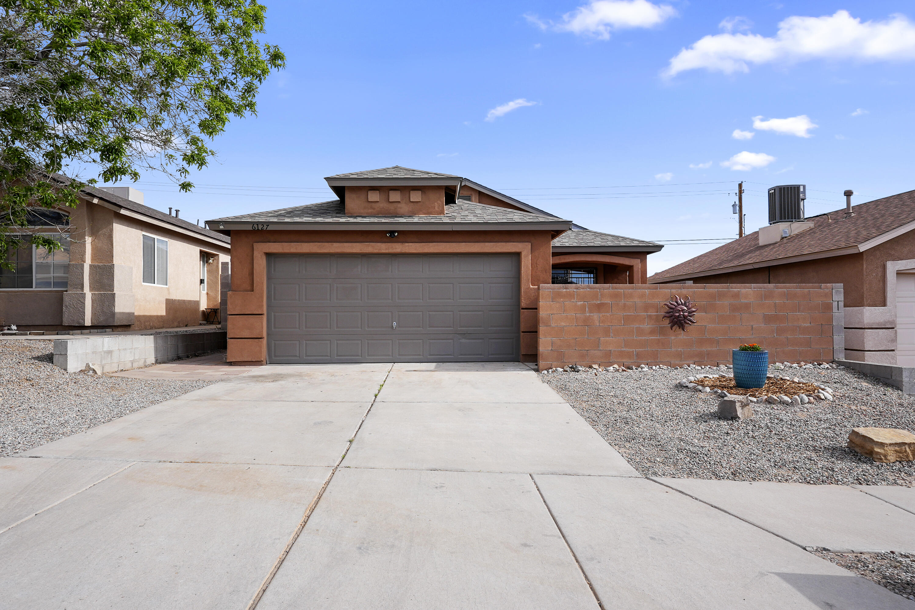 Move-in ready and beautifully upgraded! This 2-bedroom, 2-bath home offers bright, renovated, open living space. Featuring tile flooring throughout, a fully renovated kitchen, and fresh interior paint. Step outside to a fully enclosed, locking block wall courtyard--ideal for secure and private outdoor living.Enjoy the convenience of a reverse osmosis water filtration system and a whole-home water softener, providing clean, high-quality water. The finished garage includes epoxy flooring, textured walls and ceiling, and a new bright overhead light, creating a clean, versatile space for projects, parking, or storage.