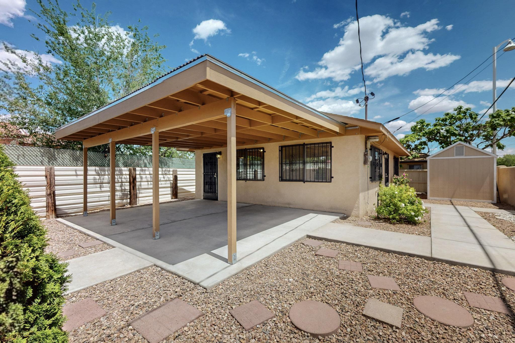 Great things come in small packages!  This completely remodeled house in SW Albuquerque has two bedrooms, one bath and a big personality.  It is completely fenced, has a large parking area and a nice covered patio.  The yard is landscaped and has a new barn-style storage shed.  The kitchen is surprisingly large, with new appliances including washer and dryer. Home inspections are already completed for your peace of mind. All appliances convey, including washer and dryer.