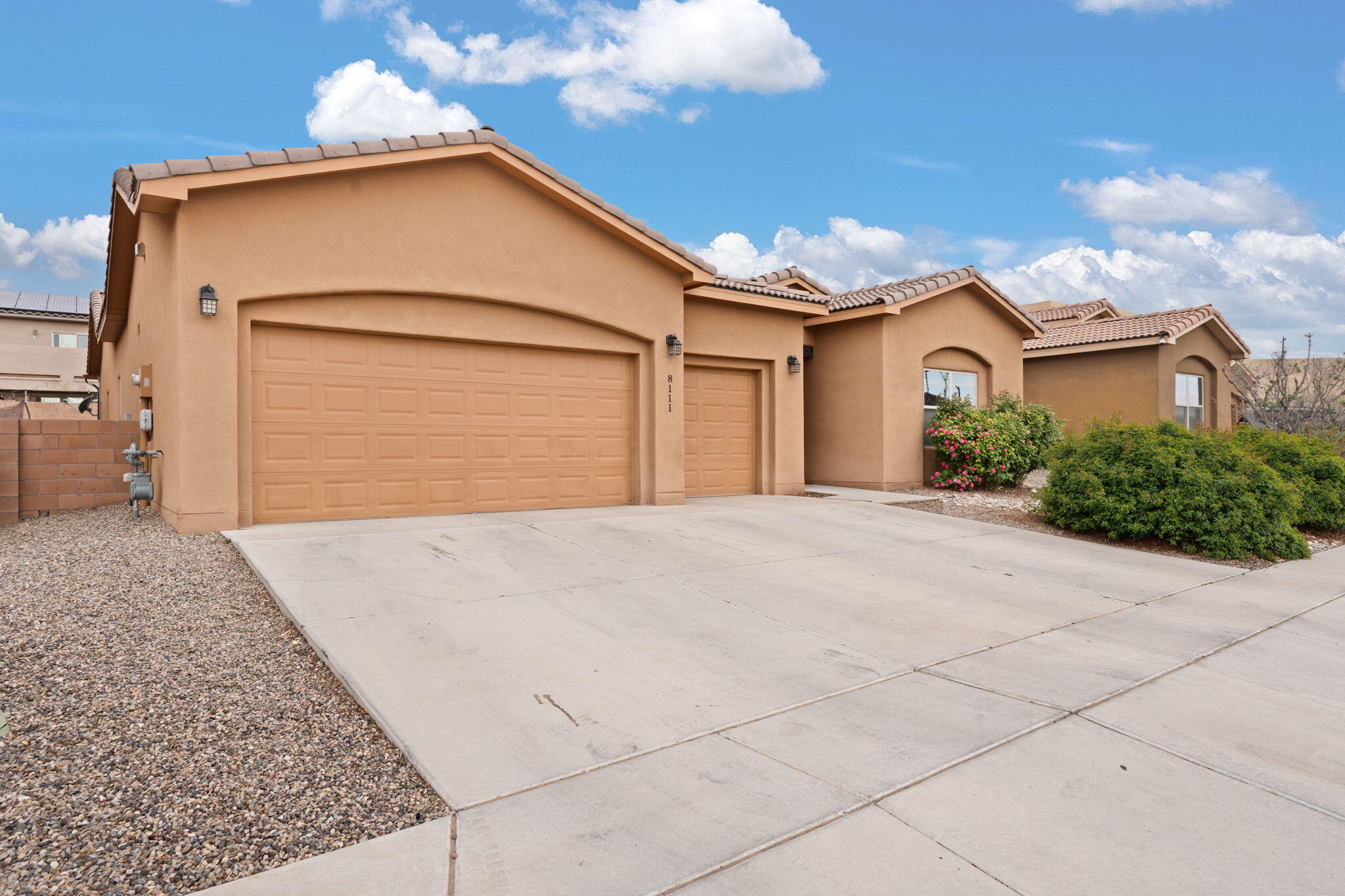 Stunning Rachael Matthews Custom home situated on a lot with views of Sandias and lush landscaping! This single level home, features a private courtyard, and a true casita with a separate entrance. The main home has vaulted ceilings, open concept with a large living room, chef's kitchen with lots of storage and a pantry. Each bedroom has it's own bathroom! Enjoy the low maintenance landscaped backyard with turf, a fireplace and lovely water feature.