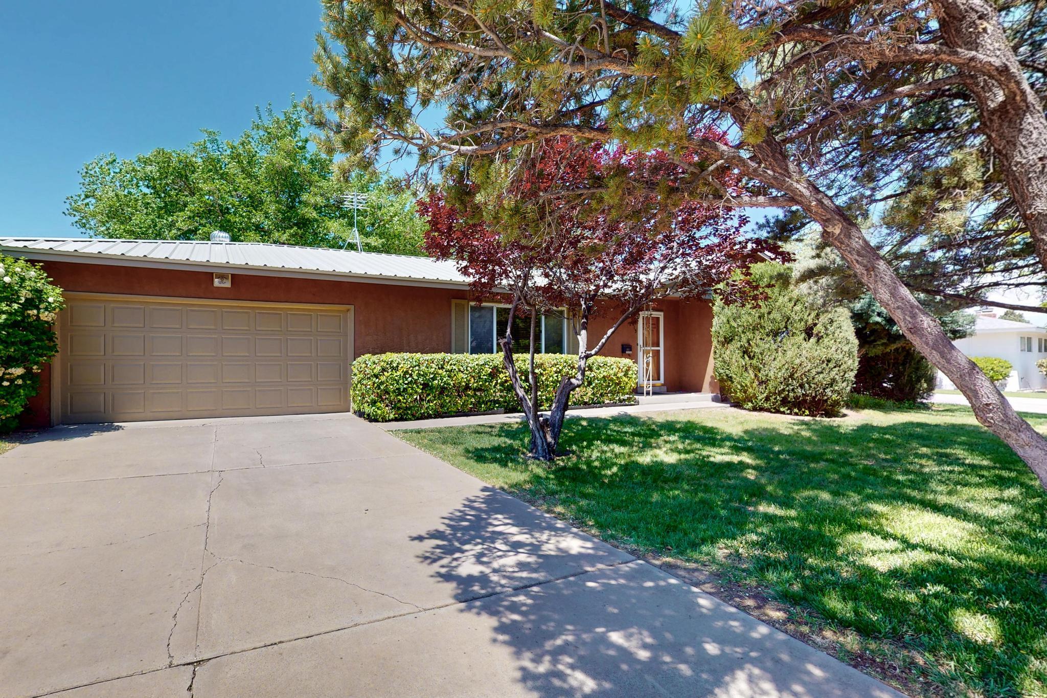 Charming Mossman home beautifully updated by long term owners. Remodeled kitchen with newer cabinets and Stainless Steel appliances. Remodeled bathrooms. Versatile floorplan - 3 large BR's PLUS centrally located office, 2 spacious living areas and Sunroom (perfect for a hot tub). Lots of storage space including linen closet. Mossman red oak HARDWOOD floors in living & dining room, office and all 3 bedrooms., Thermal paned windows throughout. Beautiful yard with shady trees and garden area. BIG 2 car garage with lots of storage.