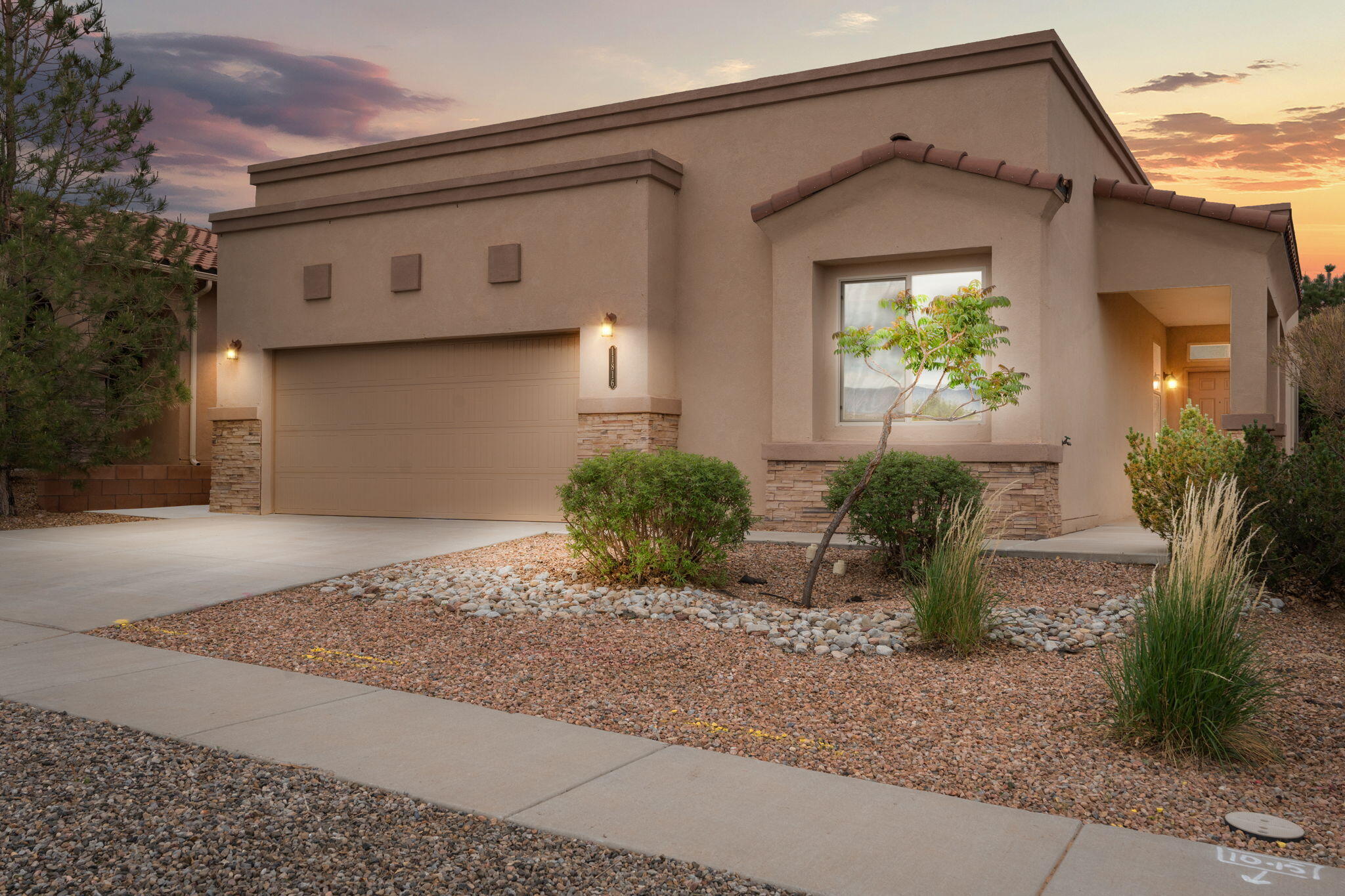 DR Horton Clark floorplan: a spacious, single-level home in Volterra that you will absolutely love! This stunning home is one of the largest single-level properties available with its 4 bedrooms, raised ceilings, and open living area/kitchen floorplan. Imagine cooking in this spacious kitchen with a breakfast bar and more. This eco-friendly home includes refrigerated air conditioning and a tankless water heater, ensuring comfort and energy efficiency year-round. The primary bedroom is thoughtfully separated from the other 3 bedrooms, offering privacy and tranquility. Ceramic tile in the high traffic areas provides durability and easy maintenance. Enjoy the comfort of refrigerated air conditioning on hot summer days. Schedule a visit today to see all this home has to offer. You'll love it!