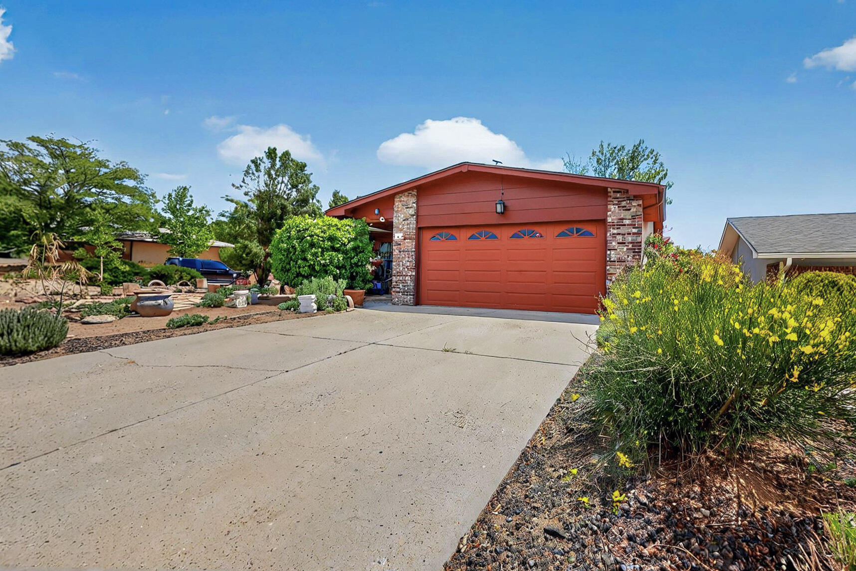 Are you in search of a home with personality and character in the Northeast Heights, under 400k, and zero HOA? This is what you have been looking for! A .20 acre corner lot, single story brick veneer home, no carpet, refrigerated AC, two living areas, a dining room and breakfast nook area both located off of the spacious kitchen with lots of cabinets and storage. Living room has a fireplace, a sliding glass door replaced in 2024 leads you out onto the large covered patio. Enjoy the beautiful private backyard, plenty of room for a garden, backyard access or put in a pool so much potential. Located near, hiking trails, biking trails, and shopping. All appliances convey and lots of storage in the garage. Call your REALTOR, schedule a showing and start investing in your future!