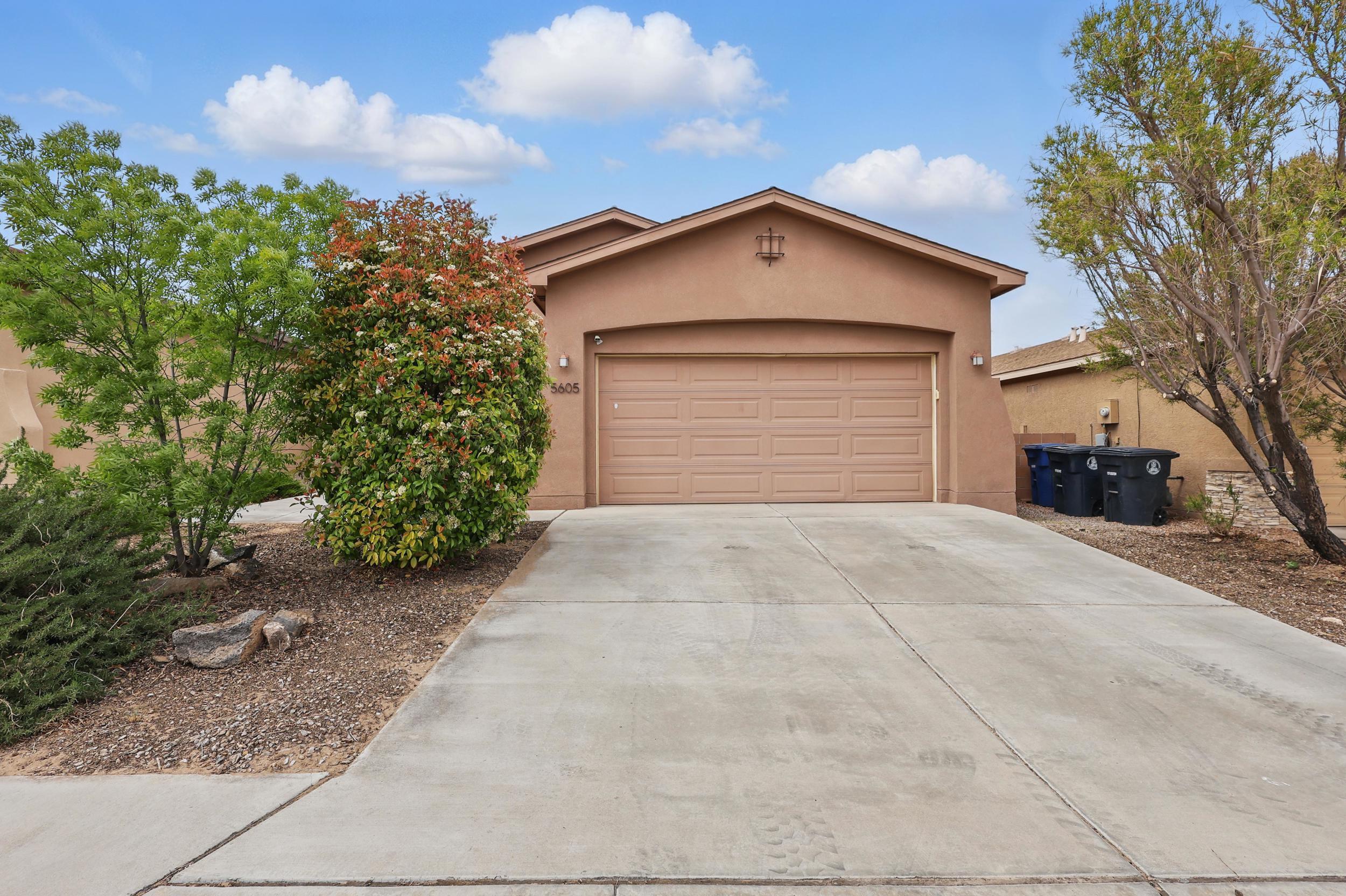 This cozy home, built in 2010 by Abrazo Homes, sits in the popular Sundance Estates neighborhood with no PID fees. It offers 3 bedrooms, 2 bathrooms, and a 2-car garage. Inside, you'll find 9' ceilings, refrigerated air, central heat with pilotless ignition, and energy-efficient PEX water lines. The kitchen includes a gas range, dishwasher, pantry, and a breakfast bar. The front and side yards are landscaped, and the large backyard is composted and ready for your personal touch. Located near Paseo del Norte and Unser, you'll enjoy easy access to shops, schools, and parks. With low HOA fees and great curb appeal, this home is perfect for anyone looking for comfort, convenience, and value in Northwest Albuquerque.