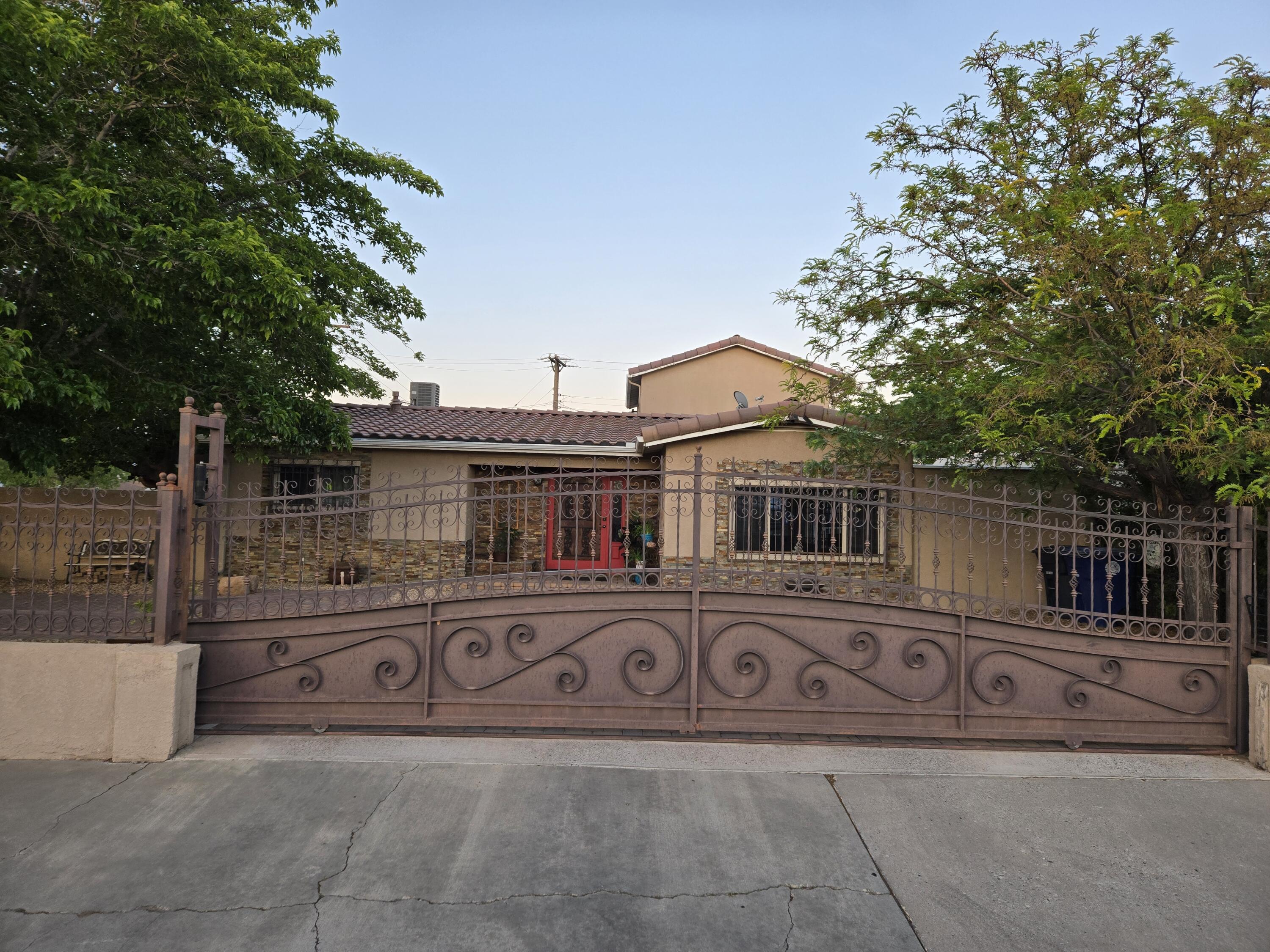 Come see this beautiful home with an open floor plan, perfect for the family gatherings, nice tile flooring, big kitchen island, the front entrance has an automatic gate into an impressive brick layered driveway.  Includes back yard access into a brick layered ready for your RV, refreshing pool for hot summer days and a jacuzzi for relaxing. Everything stays with a full price offer except the following items: smoker, chicharron maker, Embroider machine, hot press for clothes, Door Mirror, 85'' TV, 36''TV, Tall freezer and Chest freezer, personal stuff, suitcases, boxes, and vehicles.  Measurements are approximate.
