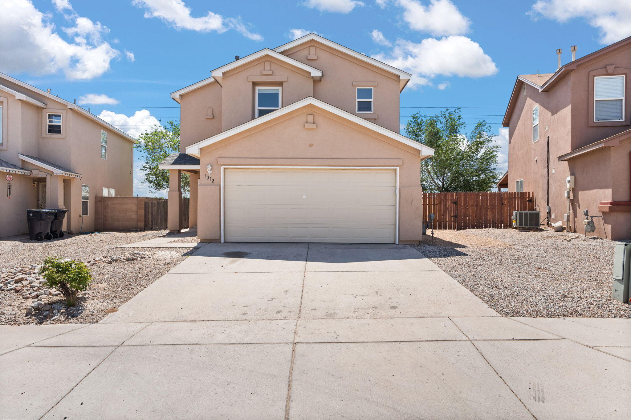 Thoughtfully renovated home in northwest Albuquerque is sure to please its next owner!  You'll love the tastefully updated kitchen cabinets, range hood, backsplash and granite countertops.  Similarly, all bathrooms have been updated with vanities, light fixtures and tiled walls in bathtub surrounds.  If that was not enough, you'll be happy with the installed vinyl flooring on the first floor and carpet on the second floor.  In addition, you'll have some peace of mind with installed roof shingles as of June 2024 and water heater as of February 2023.  You don't want to miss out on this amazing property.  Don't delay, schedule your showing today!