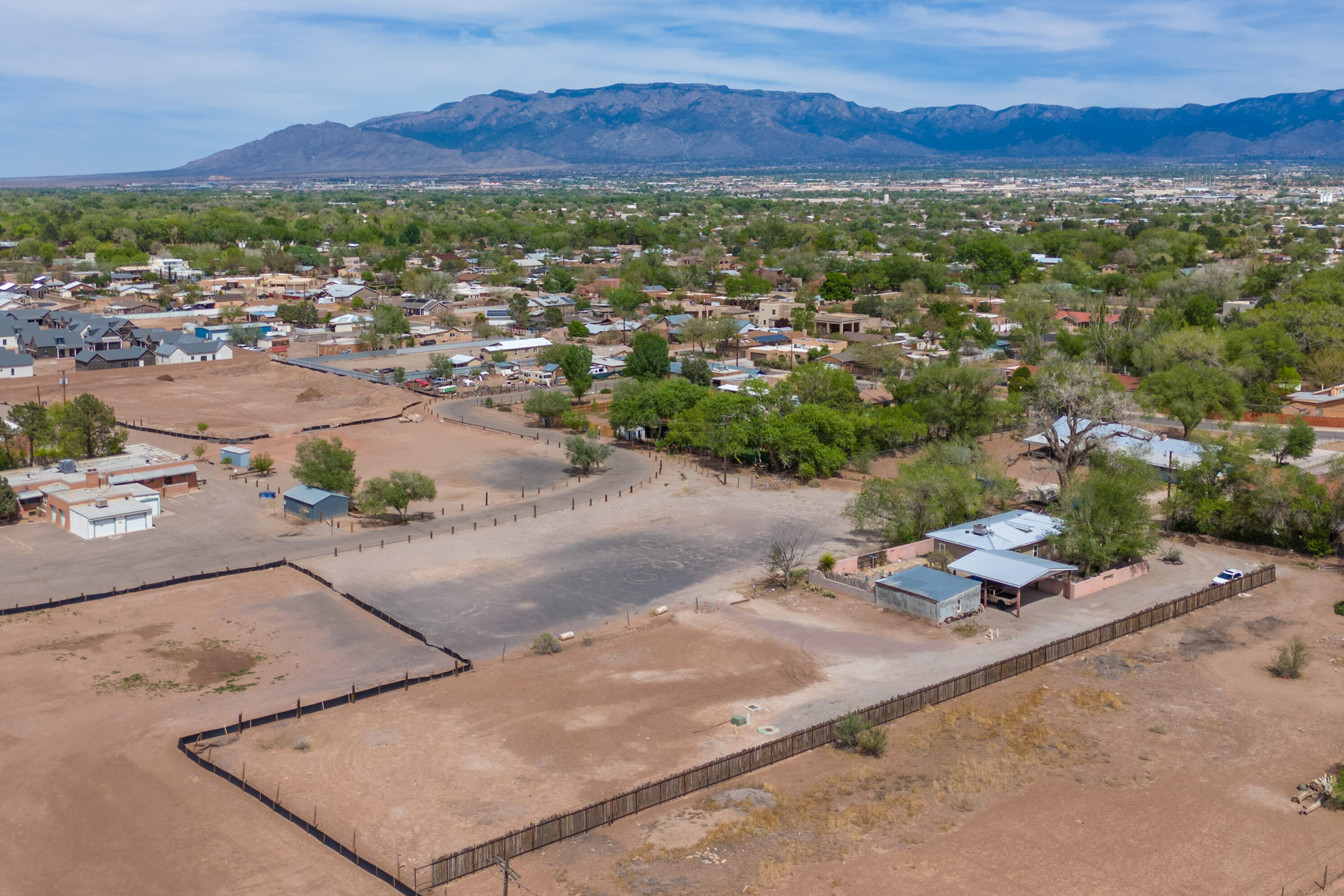 Discover a rare opportunity to build your dream home on this serene and private vacant lot in the heart of Albuquerque's North Valley. Tucked away from the bustle, this beautifully situated property offers stunning views of the Sandia Mountains and direct access to miles of tranquil walking trails along the historic acequias. Whether you're envisioning a quiet retreat or a custom residence surrounded by nature, this lot provides the perfect blend of peaceful seclusion and convenient proximity to some of the area's most beloved amenities. Enjoy being just minutes from Los Poblanos Historic Inn & Organic Farm, the cozy charm of Flying Star Cafe, and a variety of shops and services that make North Valley living both charming and accessible. Utilities are readily available in this location.