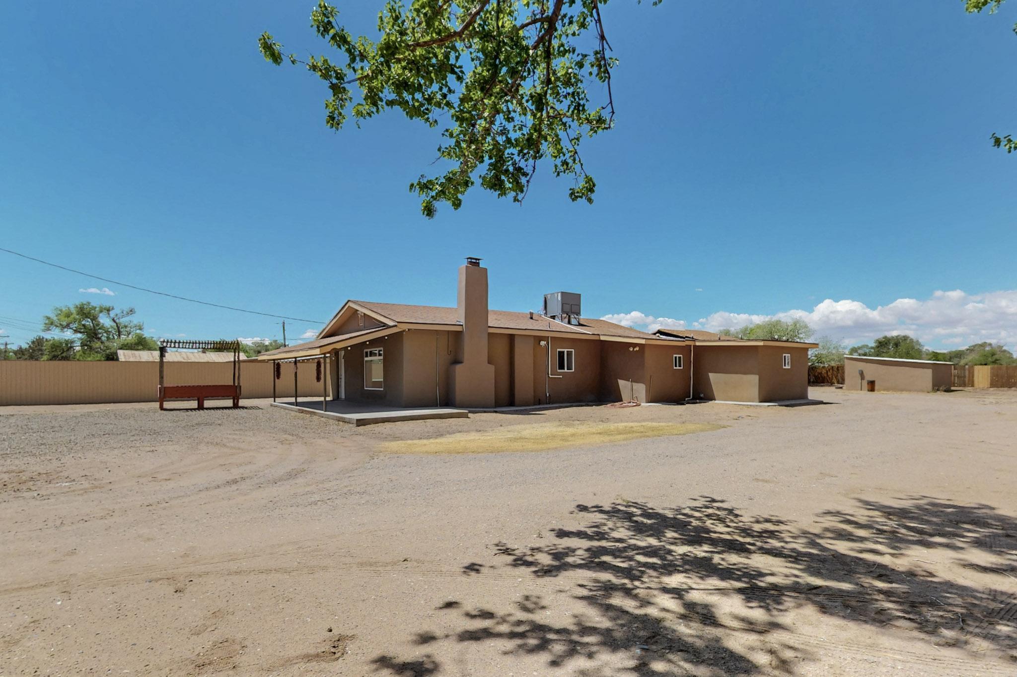 Tons of country living space in the Rio Grande Valley close to downtown. This home has beautiful custom finishes with two living room spaces. Updated from top to bottom your buyers will be wowed with this amazing 3BR/1.75BA home that sits on a near 2/3 of an acre. Features tons of storage, tankless water heater, refrigerated air, wood burning fireplace, 2 living areas, a cooks dream gourmet kitchen with granite counter tops and refrigerated air. 220 in the workshop/ garage , extra storage with a 40'x8' newer conex box with custom shelving. This is a must see!