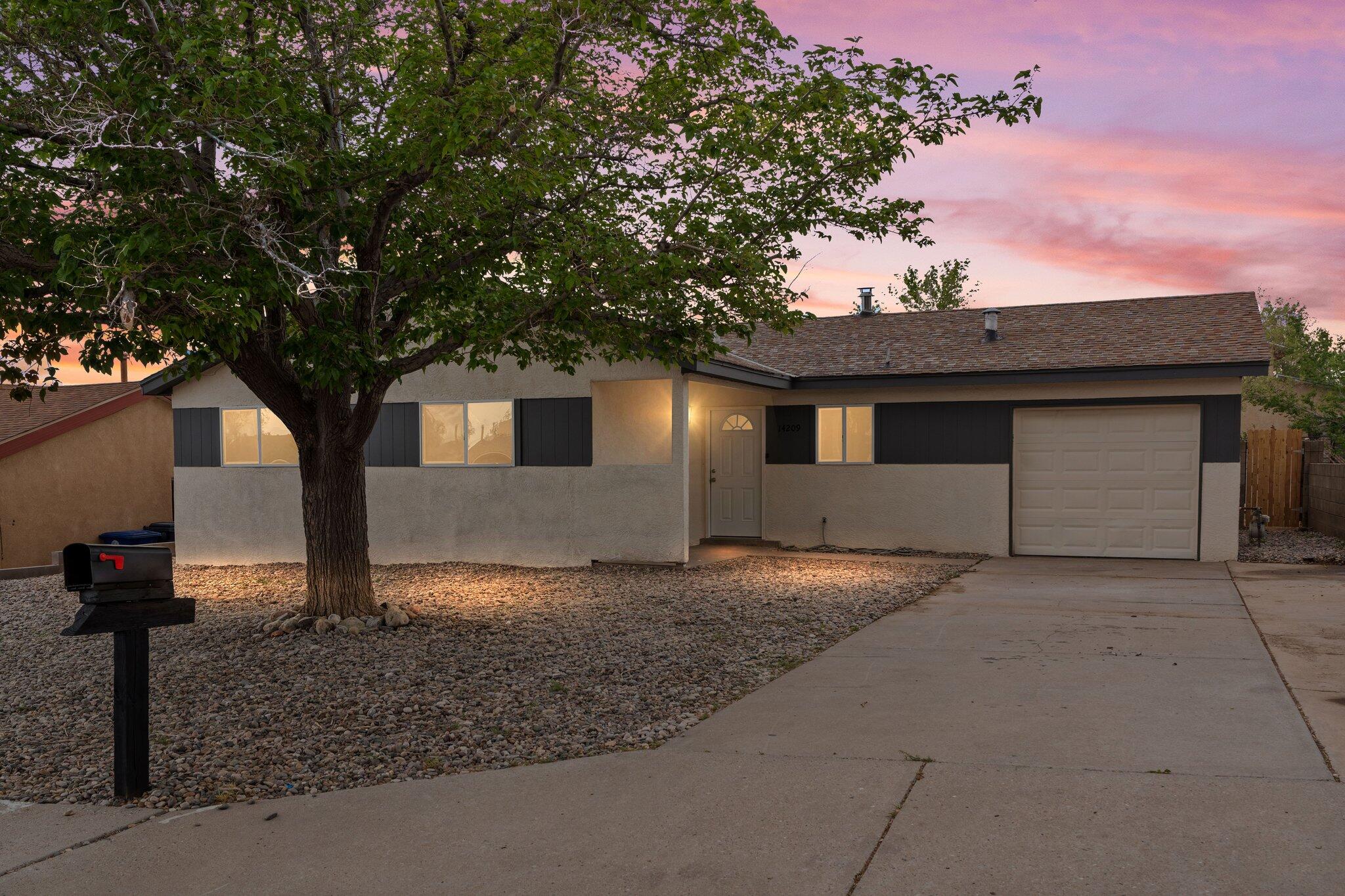 Nestled in the Foothills, this fully updated 3-bedroom home exudes modern charm and timeless appeal. Every detail has been thoughtfully considered, from fresh interior and exterior paint to new laminate flooring, new windows throughout, new furnace, and updated bathrooms. The beautifully remodeled kitchen features all-new appliances, and the heated sunroom invites an abundance of natural light, adding year-round comfort and enhancing the home's bright, airy feel. The primary suite includes its own ensuite bathroom with a walk-in shower for added privacy and convenience. Outside, the spacious, walled backyard offers endless possibilities for outdoor living. With a 1-car garage and a move-in ready atmosphere, this home is the perfect blend of comfort, style, and quality. Welcome home!