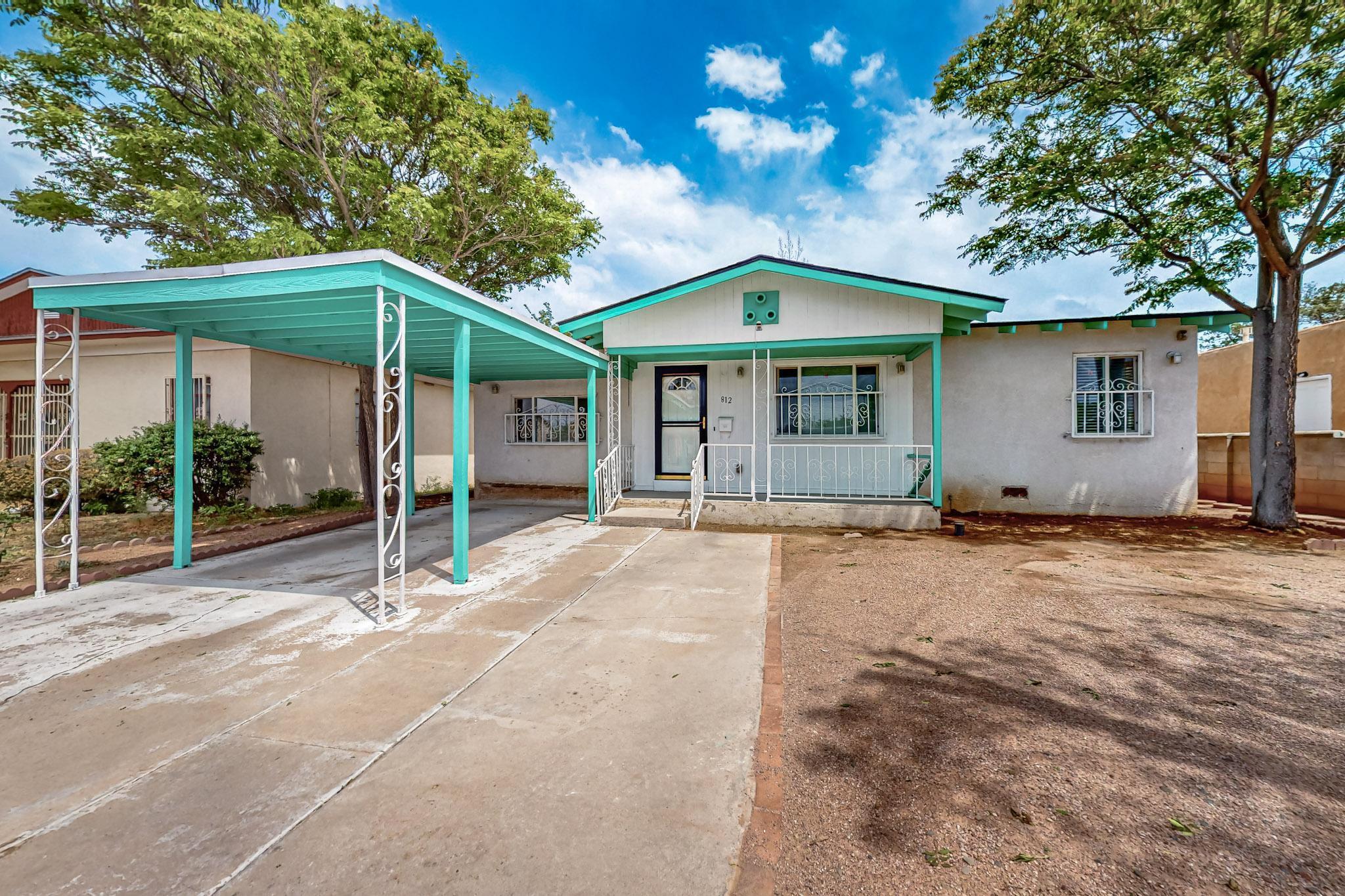 Charming Updated Home in the Heart of the SE Heights - 812 Cardenas Dr. SE, Albuquerque, NM 87108Welcome to this inviting 3-bedroom, 1-bath home, offering comfort, charm, and thoughtful updates throughout--all priced at $255kStep inside to find beautiful original wood flooring in the bedrooms, complemented by new flooring in the main living areas, bathroon and kitchen The home features updated fixtures, a newer washer and dryer, oven, and refrigerator which all convey --making it truly move-in ready.Stay cool during the summer with the efficient Master Cool system, and enjoy peace of mind with rod iron window security. The roof and patio roof were replaced approximately 4 years ago, ensuring long-term durability.