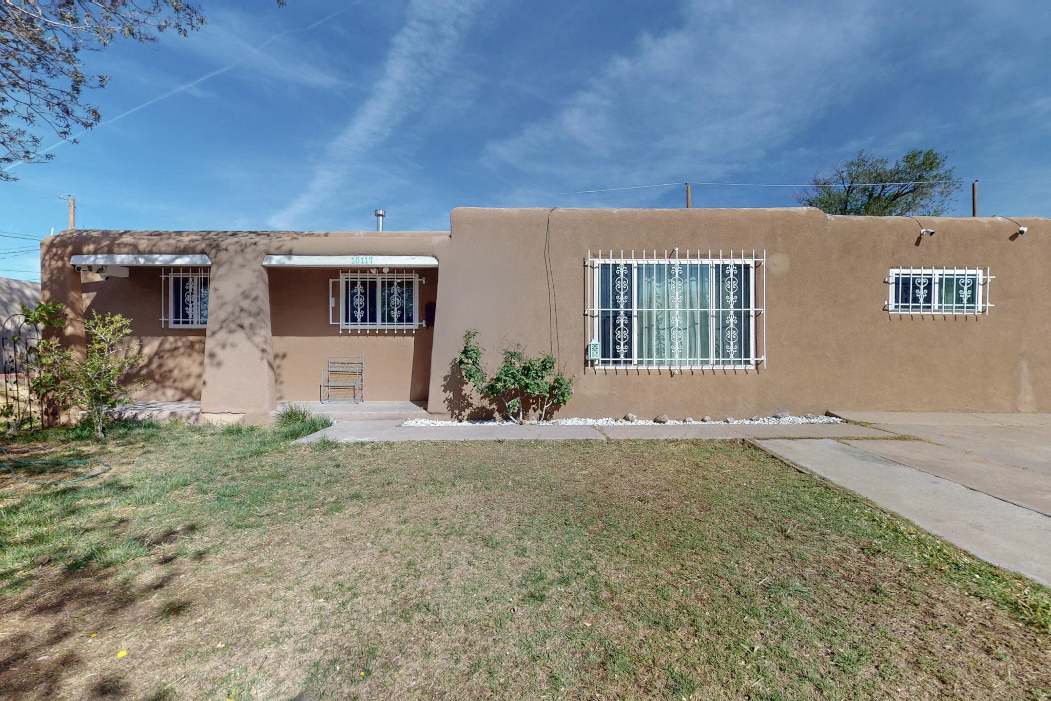 LOTS of updates for home that was loved and cared for in the last 8 years! This well-maintained Northeast Heights home offers 4 bedrooms, 2 bathrooms, bright and open living spaces, 2 fireplaces, a generous backyard, and near the Sandia Mountains. Conveniently located near trails, parks, shopping, dining, and I-40 for easy commuting. Enjoy Albuquerque's 300+ days of sunshine, outdoor activities, and rich cultural experiences. Schedule a showing today and see all this inviting home has to offer!