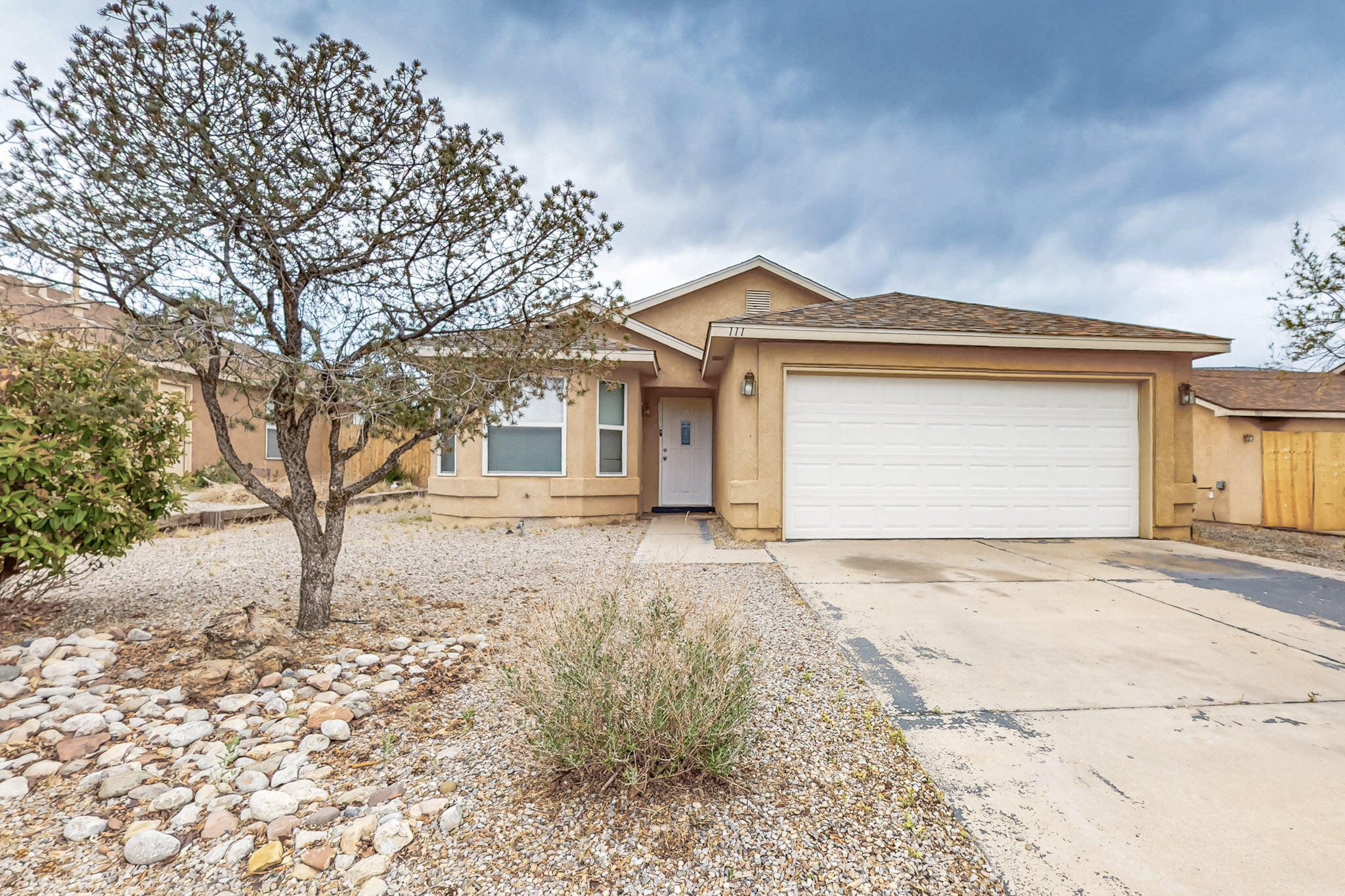 Location, amazing mountain views with a large yard!  Welcome to your dream oasis where comfort meets contemporary style! This beautifully updated home boasts remodeled bathrooms.  Kitchen equipped with with new stainless steal appliances incuding an oven with a built in air fryer for all your culinary adventures.  The elegant granite countertops elevate the kitchens aesthetic, making it the perfect space for entertaining or cozy family dinners. Freshly painted creating a bright and inviting atmosphere throughout. the home features a newer garage door, roof, and a/c. This home also boasts ample attic space for your storage needs. Potential backyard access, no HOA no PID, you can fully embrace the freedom of homeownership without the burden of additional fee or regulation