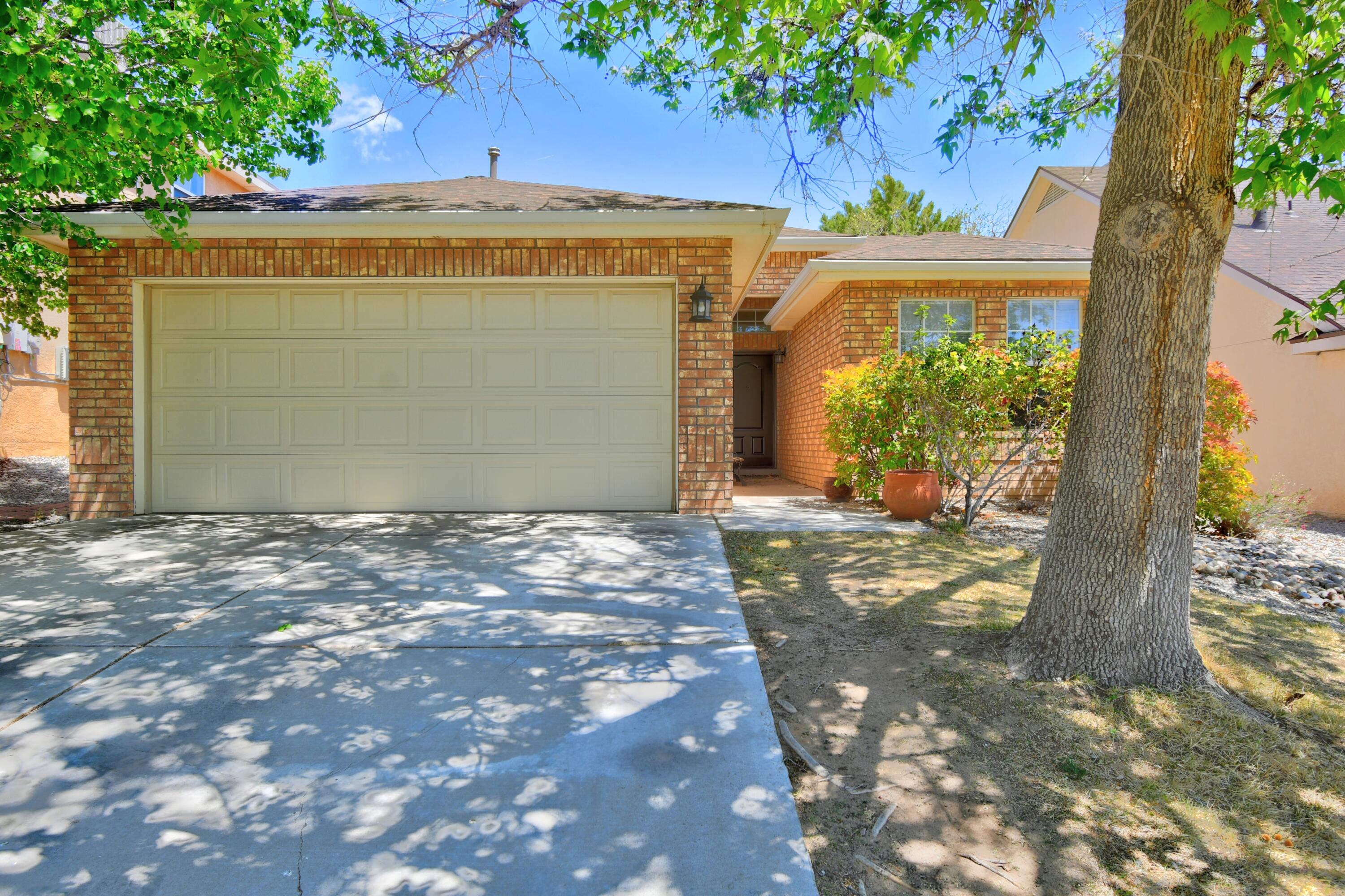 This adorable single-story gem is bursting with personality and sunshine thanks to its open floor plan and abundant natural light. HUGE kitchen complete with stainless steel appliances, bar-top seating, and a pantry overlooking the living area with raised ceilings and a gas fireplace!Over the past five years, some major mechanicals have been replaced: refrigerated air, furnace, roof with gutters, insulated garage door, and sleek Andersen doors! The home also features a private backyard with mature landscaping--perfect for relaxing evenings or weekend BBQs.