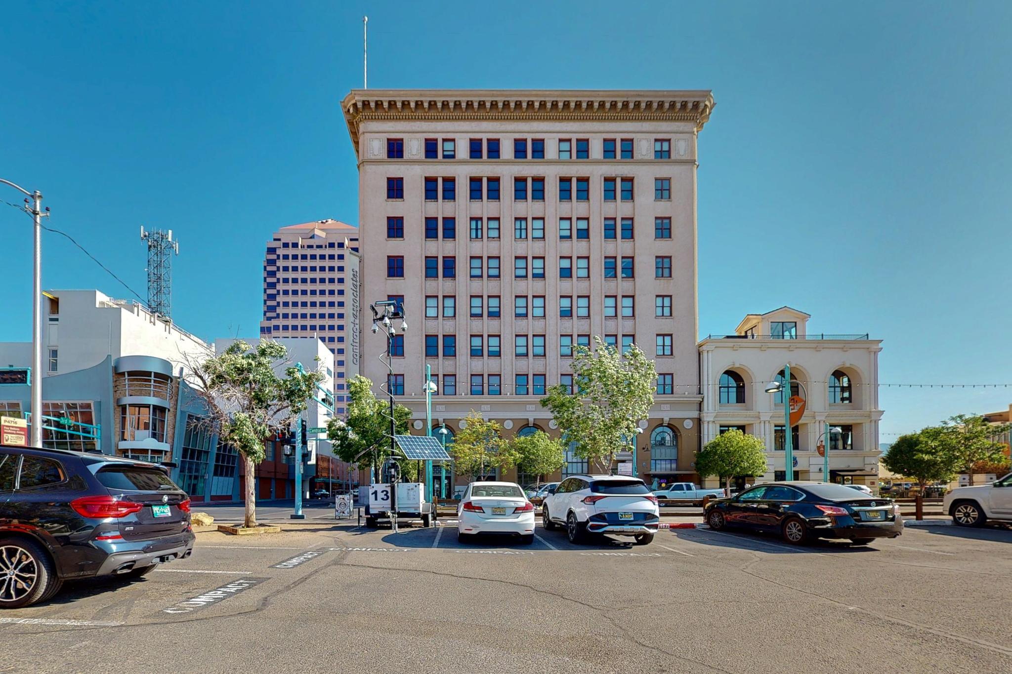 Experience modern luxury in this brand-new 2 bed, 2.5 bath condo set within a beautifully restored historic building in the heart of downtown. You'll be walking distance to the Convention Center, Civic Plaza, and office buildings. This stylish features high-end finishes, an open layout, spacious en-suite and a private balcony--perfect for enjoying your morning coffee or evening views. Residents enjoy secure access, a full-time security guard, and stunning rooftop views of the city skyline. A parking garage is available with secure access from the 5th floor. Moka Joes coffee, located in the building, for great coffee and eats. Plus, you're just steps from top restaurants, shopping, and public transit. This condo offers the perfect balance of convenience, comfort, and character.