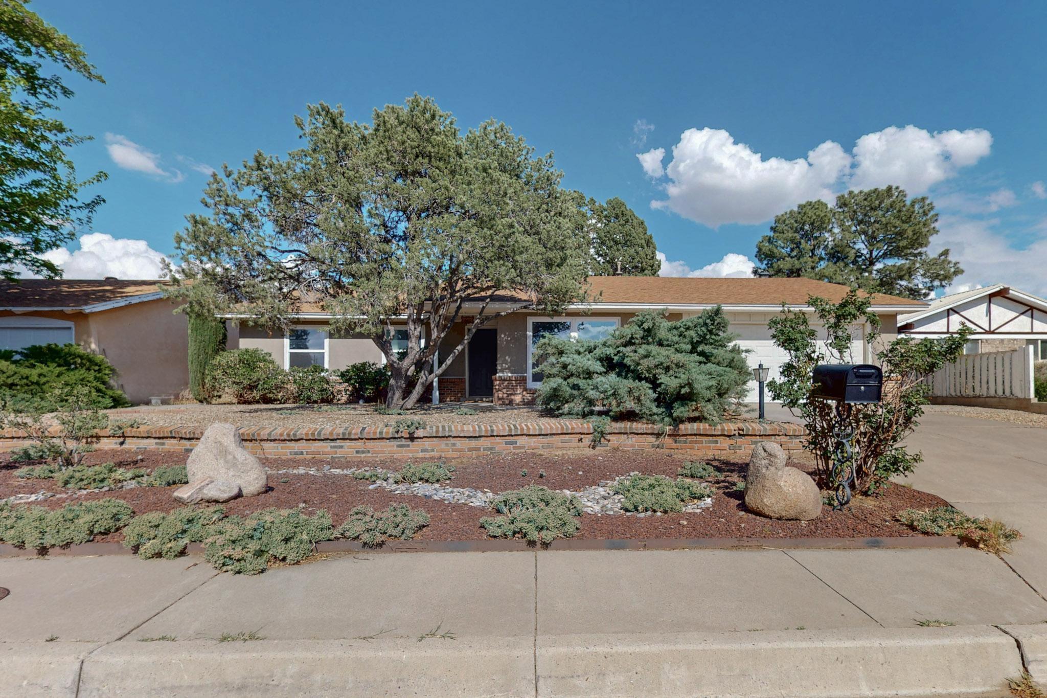 This beautifully upgraded 3-bed, 3-bath home features a stunning floorplan and two primary suites--perfect for multi-generational living, office, or gym space. Enjoy the gorgeous kitchen with granite counters, stone backsplash, stainless appliances, and a cozy fireplace. Recent upgrades include new water heater, washing machine, microwave, dishwasher and AC conversion in 2023. The spacious patio is ideal for entertaining. Nestled in a wonderful, established neighborhood near the golf course, top restaurants, and shopping. This gem won't last--schedule your tour today!