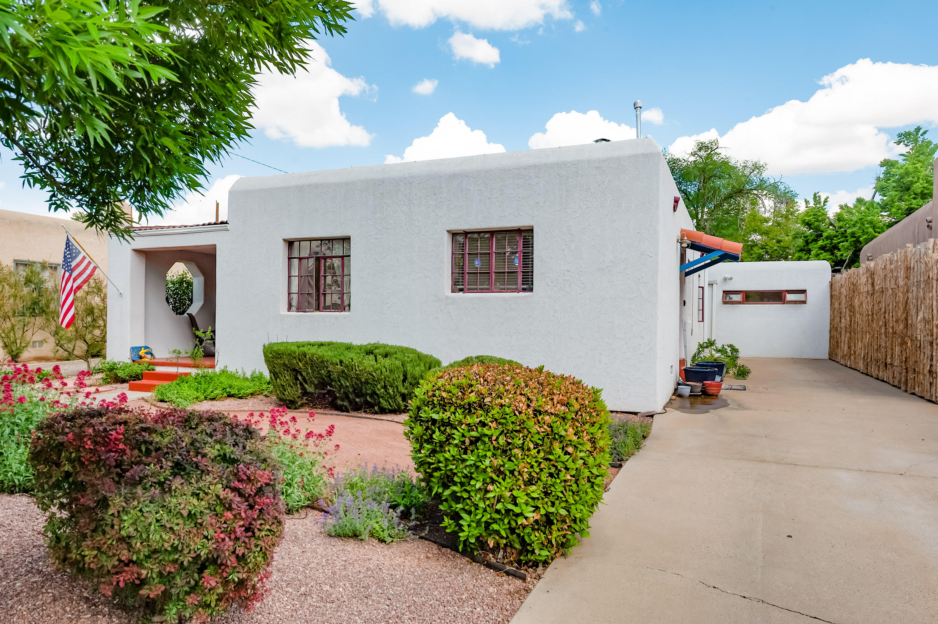 Welcome to this rare and beautifully upgraded Nob Hill residence, perfectly positioned in one of Albuquerque's most sought-after neighborhoods. From the moment you arrive, you'll be captivated by the impeccable curb appeal and lush, professionally designed landscaping in both the front and back yards--ideal for relaxing or entertaining.Step inside to discover a home brimming with charm and character, seamlessly blending modern upgrades with classic Nob Hill appeal. The inviting kitchen features stainless steel appliances, sleek solid-surface countertops, and a built-in washer and dryer with generous counter space above for added functionality.Offering three spacious bedrooms and two bathrooms, this home provides both comfort and flexibility. But the real bonus? A detached space that's