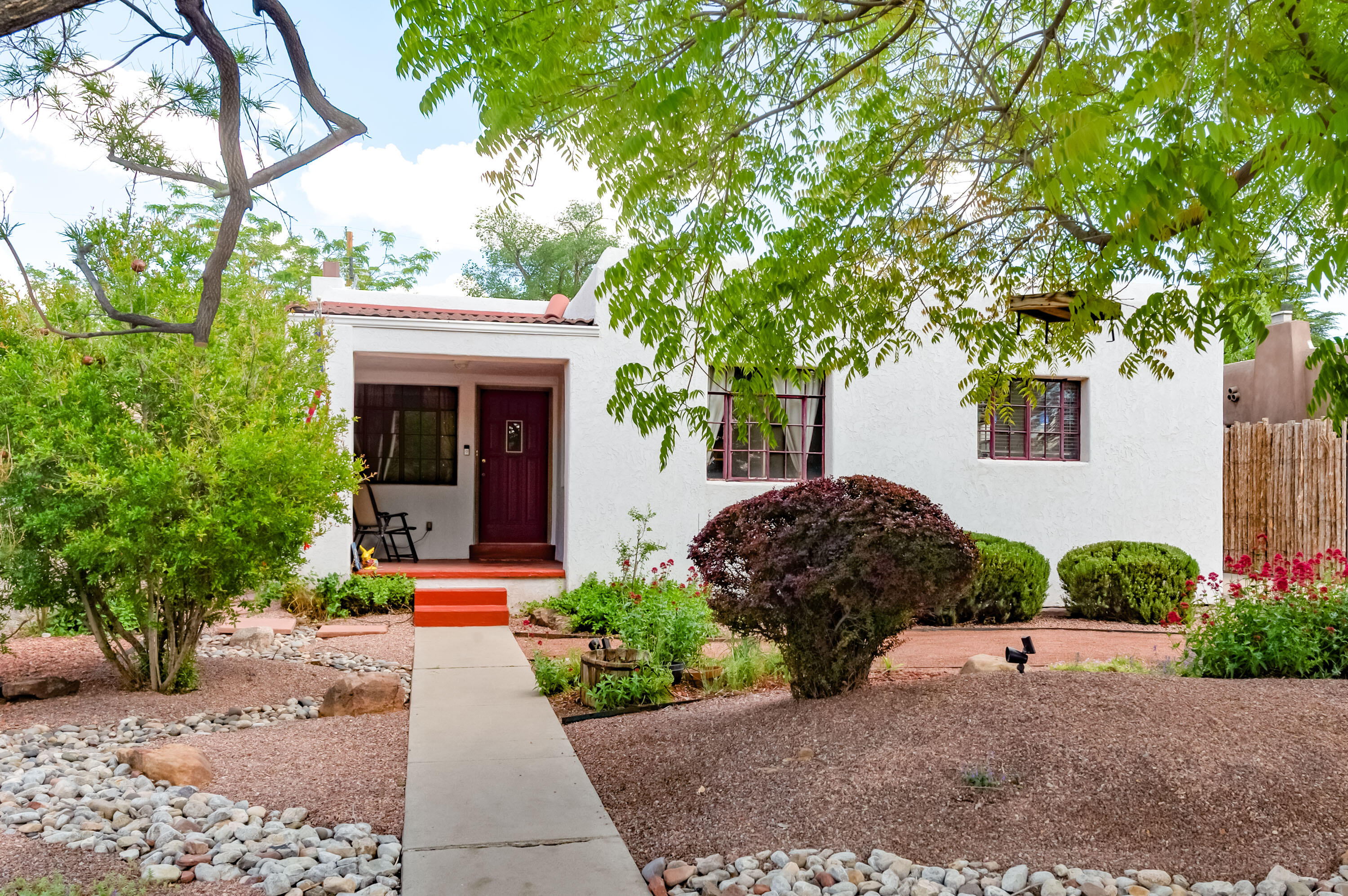 Welcome to this rare and beautifully upgraded Nob Hill residence, perfectly positioned in one of Albuquerque's most sought-after neighborhoods. From the moment you arrive, you'll be captivated by the impeccable curb appeal and lush, professionally designed landscaping in both the front and back yards--ideal for relaxing or entertaining.Step inside to discover a home brimming with charm and character, seamlessly blending modern upgrades with classic Nob Hill appeal. The inviting kitchen features stainless steel appliances, sleek solid-surface countertops, and a built-in washer and dryer with generous counter space above for added functionality.Offering three spacious bedrooms and two bathrooms, this home provides both comfort and flexibility. But the real bonus? A detached space that's