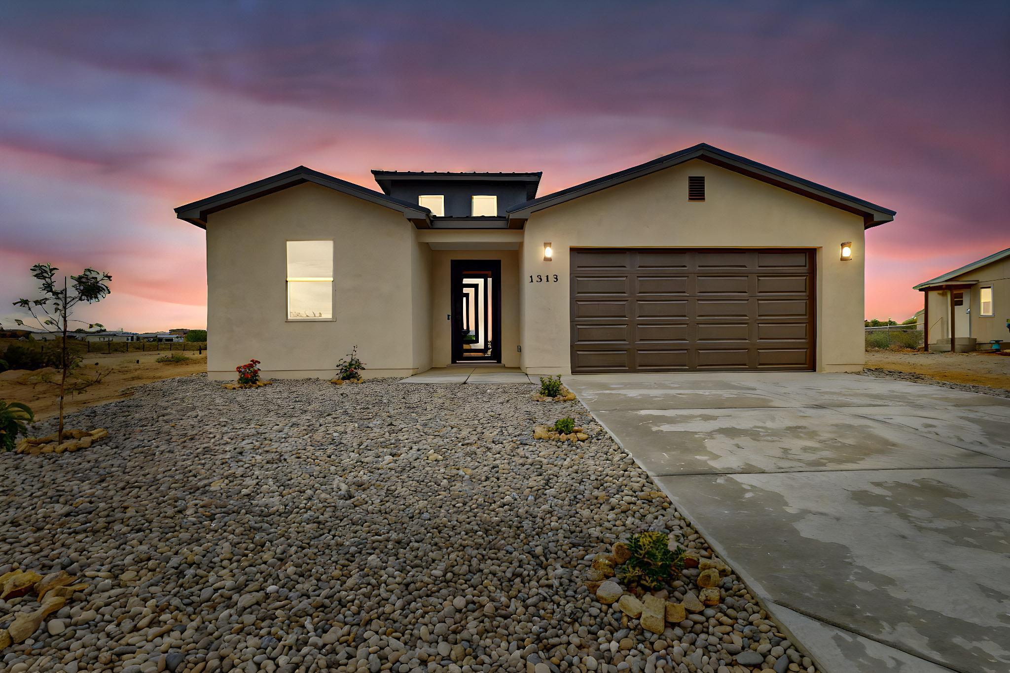 *SELLER OFFERING 5,000$ towards buyers closing cost* NEW CONSTRUCTION in the Southeast of Rio Rancho. Very sought after location sitting on a sizable lot about a .4 of an acre with backyard access. No HOA. Luxury finishes with custom cabinetry with crown molding, quartz countertops, gold finishes, and new stainless steel appliances that come with the house. This home features a Black Metal Roof and TPO. It has a combo unit with Refrigerated air, a covered patio, and landscaping around the house. Landscaped in the front, and fenced in the back. Come see this house soon!