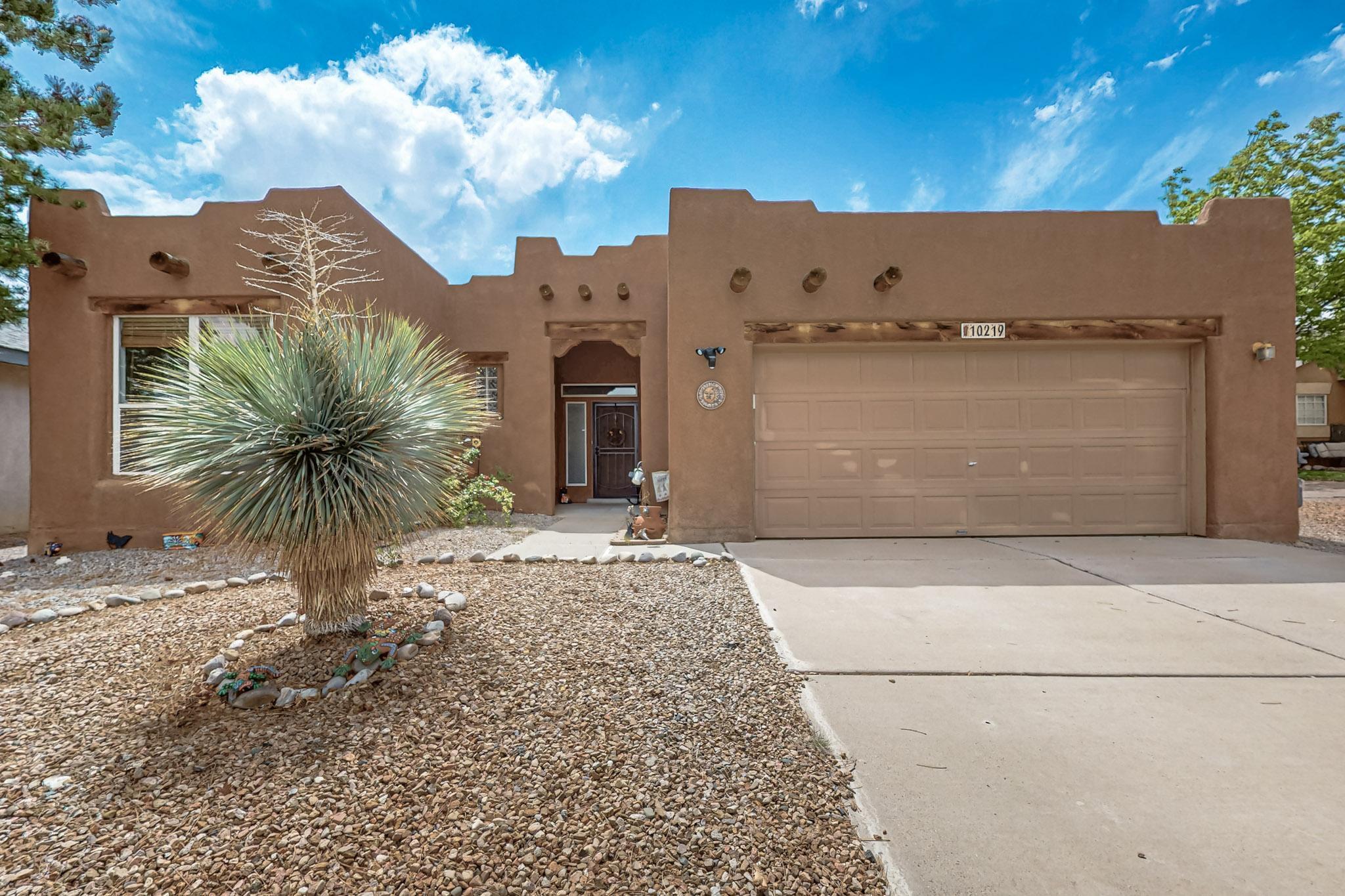 Southwest Charm Meets Modern Comfort! This stunning 3-bedroom, 2-bathroom home blends Southwest style with a modern touch. Featuring an open-concept layout, the spacious living room flows seamlessly into the dining area and a beautifully appointed kitchen with stainless steel appliances. Engineered wood flooring runs throughout the home, complemented by striking wood beams and a cozy Kiva fireplace that adds warmth and charm. Step outside to a covered patio--perfect for relaxing or entertaining. Additional highlights include an $18,000 home generator for added peace of mind, AC installed 2018, Water heater 2020, backyard shed. Sits at the end of a quiet cul-de-sac, in a scenic community with walking trails, parks, and mountain views, just minutes from top-rated schools.
