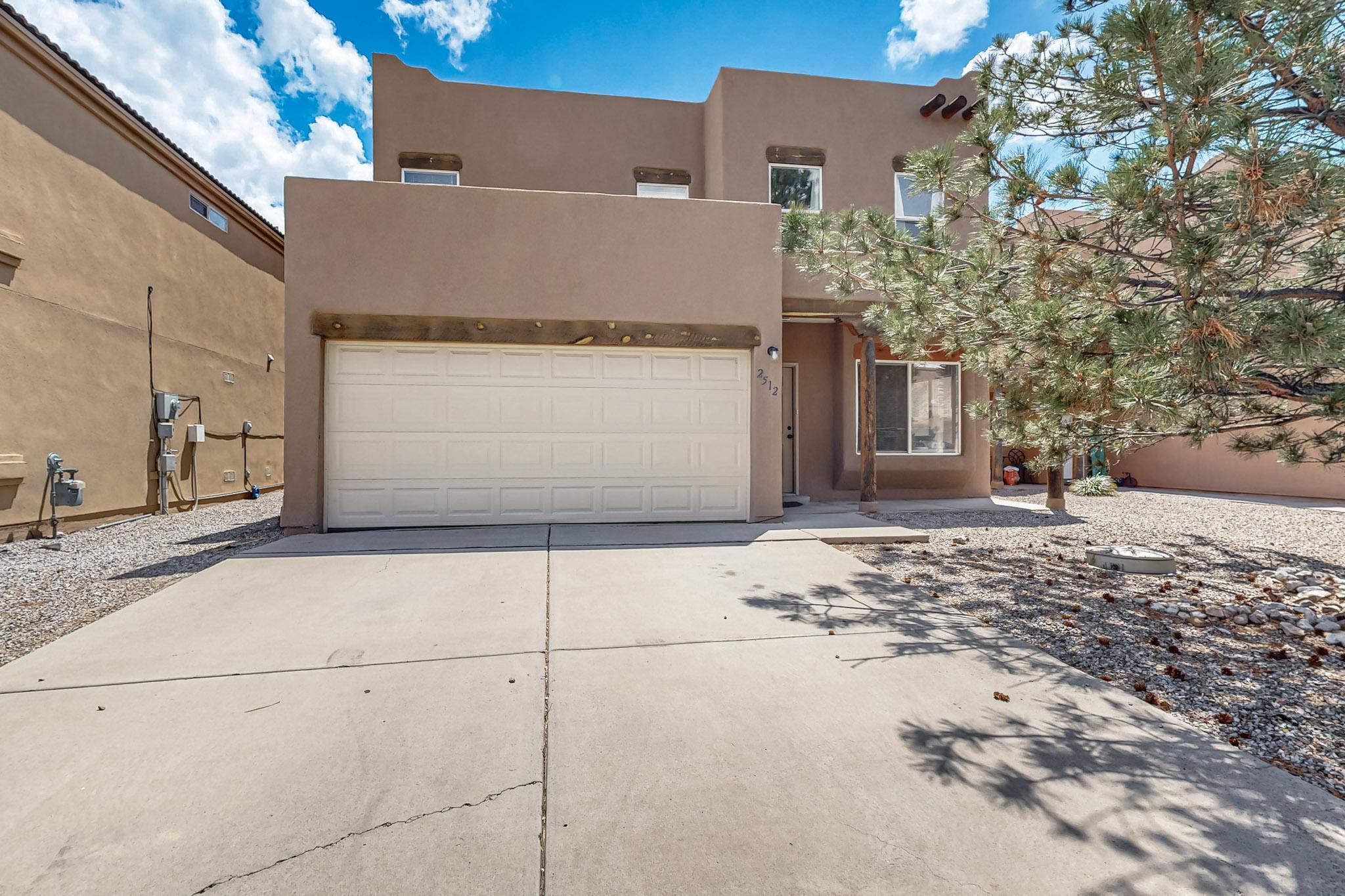 Stay fresh and cool in the summer with this spacious and conveniently located home in the lower North Valley. Just a couple minutes to Old Town and the Rio Grande River and Bosque Trails, and seamless access to I-40 to connect you to the rest of the city in no time. Freshly renovated bathrooms, refrigerated air conditioning, a huge loft area and a downstairs primary bedroom suite are some of the highlights. An outdoor balcony and covered patio provide the joys of indoor/outdoor living. Imagine having an HOA that actually benefits you! The front yard is always cared for through your HOA dues here.