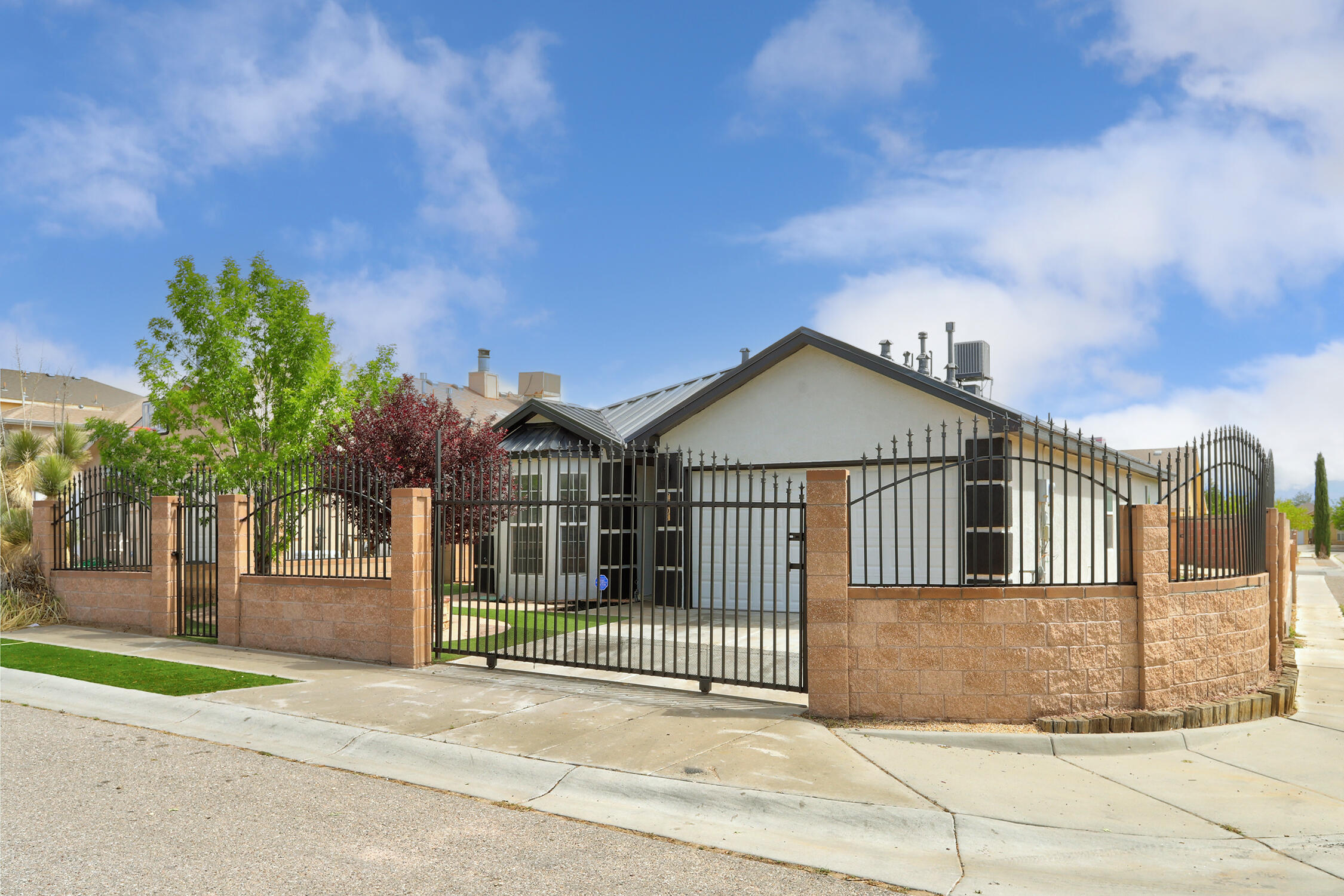 Welcome to this beautifully updated gated home in a desirable Westside neighborhood! With 1,760 square feet of living space, this single-story gem offers 3 spacious bedrooms with the flexibility for a 4th, perfect for a home office or guest room.Enjoy the benefits of modern upgrades including a brand-new roof, new bathrooms, newer HVAC/air conditioning, and fresh paint inside and out. The kitchen has been almost fully renovated with new appliances, updated cabinetry, and stylish fixtures.The home features tile floors throughout, enhancing both elegance and durability. The open-concept living area is perfect for entertaining, while large windows bring in plenty of natural light.Situated on a quiet cul-de-sac, this move-in-ready home offers comfort, functionality, and style all in one packa