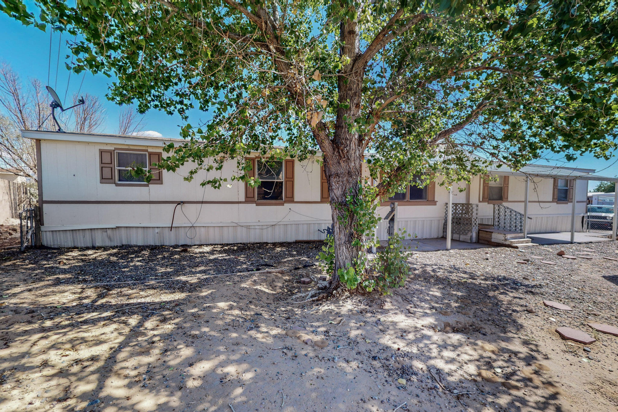 This is an amazing opportunity to own a home priced under market value. Super spacious home with open conceptfloor plan. This is great for entertaining! Master bedroom is very spacious and has a huge walk in closet, his and hers separate vanities, and updated tileshower. Location is near groceries and necessities. Roof was replaced in 2022. No HOA or land lease!