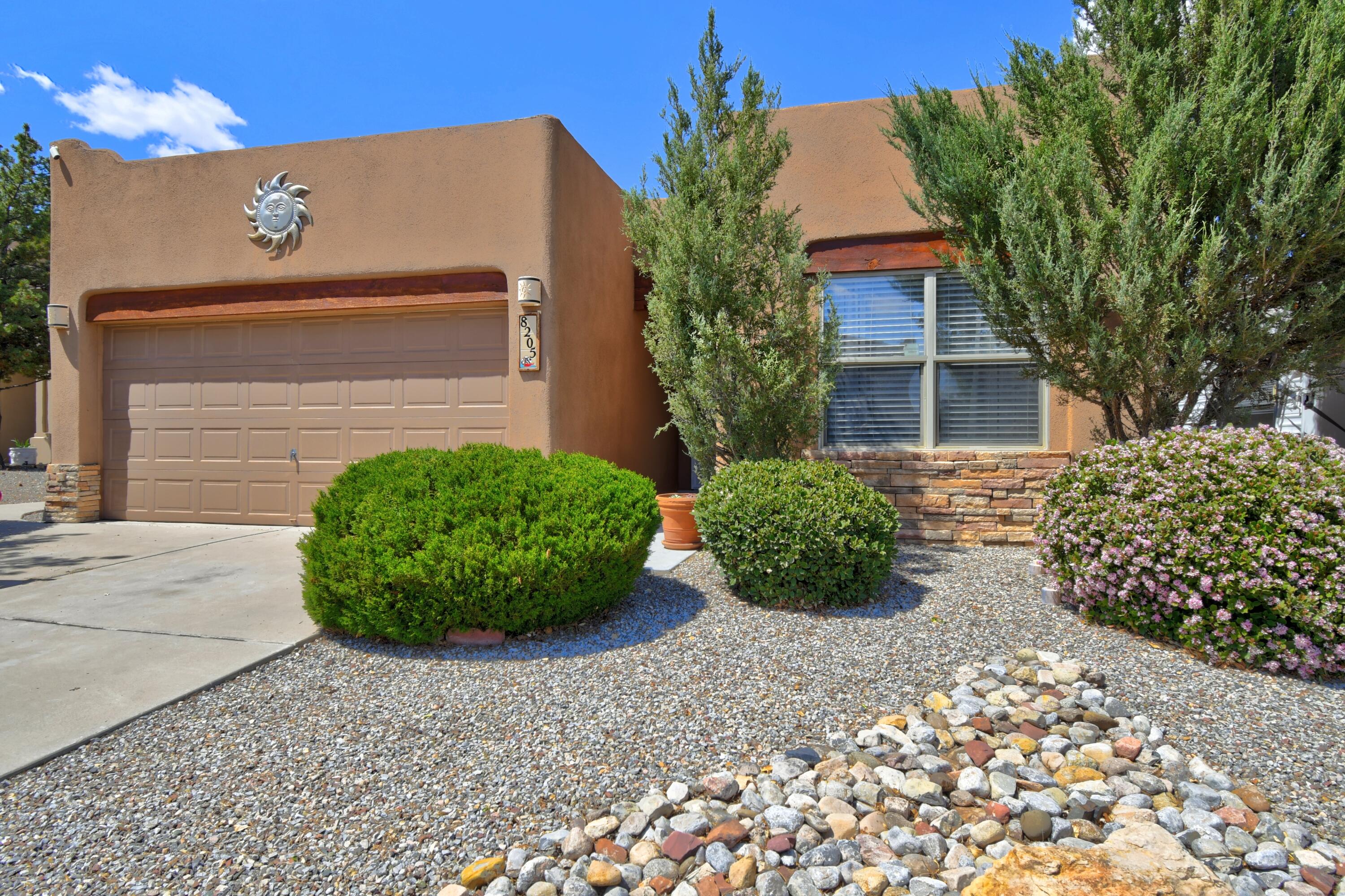 Welcome to 8205 Mandarin Place, located in Northwest Albuquerque. This charming 3-bedroom, 2-bath home offers 1,414 square feet of comfortable living space. The open-concept design features a spacious living and dining area, perfect for entertaining or relaxing. The kitchen is thoughtfully designed with the right amount of space to prepare meals and includes a nice pantry for extra storage.Each of the three bedrooms is generously sized, and both bathrooms are full and well-appointed. Step outside to a beautifully landscaped backyard with a stunning patio ideal for outdoor gatherings or enjoying quiet New Mexico evenings. Situated on a very nice street, this home is conveniently close to restaurants, shops, and all the essentials. Don't miss this opportunity to own a move in ready gem.