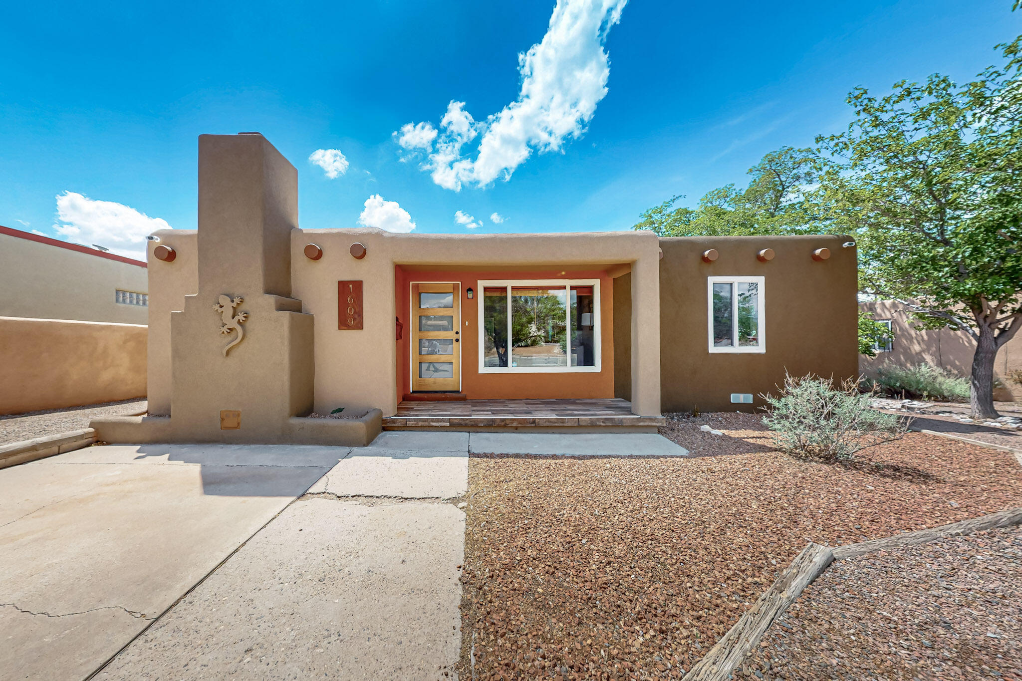 Welcome to this beautifully updated home. Enjoy peace of mind with recent major updates, including all new plumbing, upgraded electric service, newer TPO roof, and energy-efficient double-pane windows. The exterior boasts new weatherproof synthetic stucco, a newly installed privacy fence and low-maintenance xeriscaping. Inside the home features fresh paint, new texture, modern trim, and updated hardware throughout. The kitchen is a true standout, with hand-built cabinetry, recent appliance upgrades, and stylish finishes. Stay comfortable year-round with a newer HVAC system, including a new furnace and refrigerated A/C. Additional highlights include new fitted blinds throughout, a spacious 300+ sqft custom deck, and a nearly 900sqft basement transformed into the ultimate clubhouse.