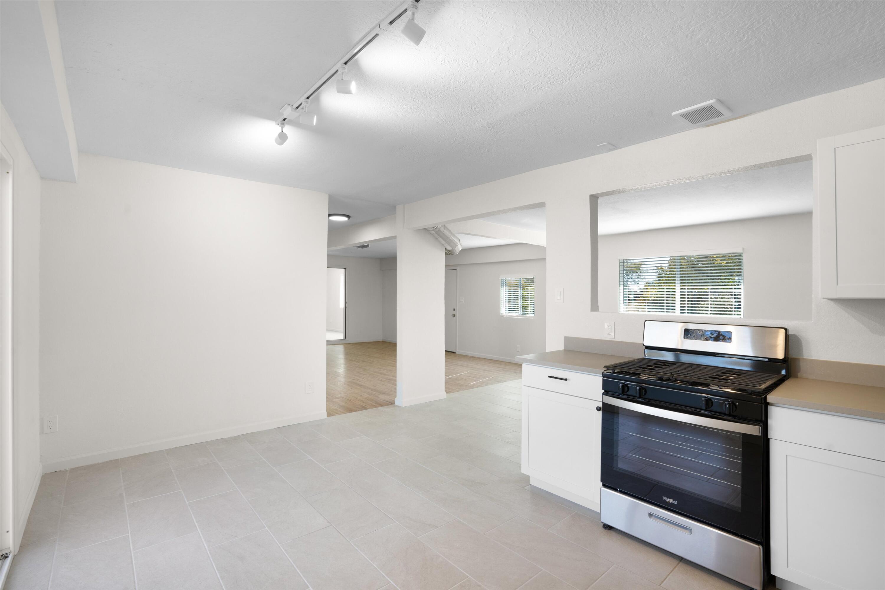 Welcome to 1615 Saunders--a beautifully remodeled 6-bedroom, 2-bathroom home that's more than just a place to live. It's a space to thrive, grow, and invest in your future. Tucked away on a quiet street, this gem sits on an oversized lot offering privacy, versatility, and plenty of parking.Step inside and you'll immediately notice the attention to detail: shaker cabinets, gleaming quartz countertops, upgraded flooring, and all-new appliances. New windows and doors enhance both comfort and efficiency, while brand-new refrigerated air units keep things cool in the summer months. With a newer roof and fresh stucco, this is truly worry-free living.
