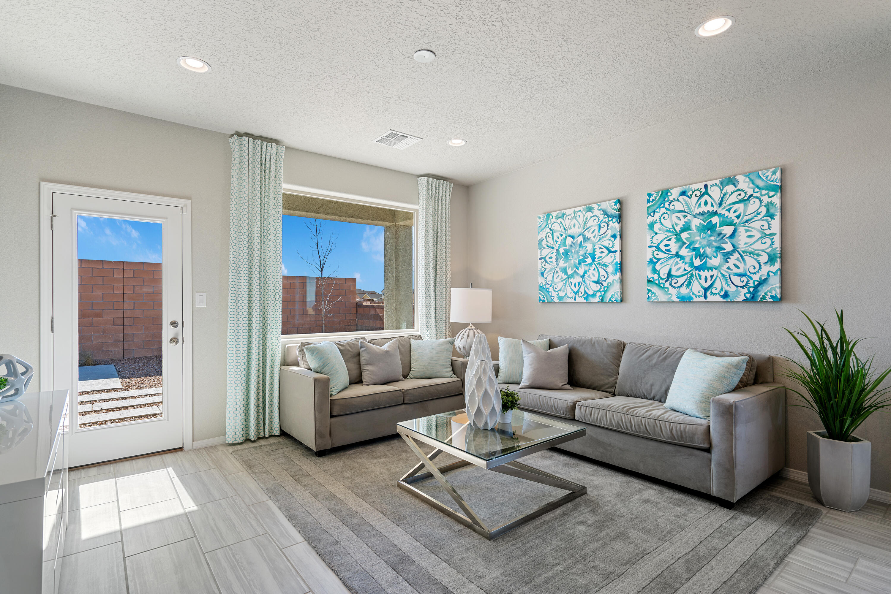 WE WELCOME BROKERS WITH OPEN ARMS! Come see our beautiful Savannah floor plan in our brand-new Rio rancho Stonegate community. This floor plan is 4 bed 2.5 bath plus upstairs loft space. This home features a beautiful kitchen with granite countertops, backsplash tile and, plenty of cabinets, The open concept kitchen dining and living space make this home ideal for entertaining, plus back yard features a covered patio and walled area. Large 5ft walk in shower in primary bedroom and double sinks make mornings easier. Primary located on main level and home features a Large laundry room.