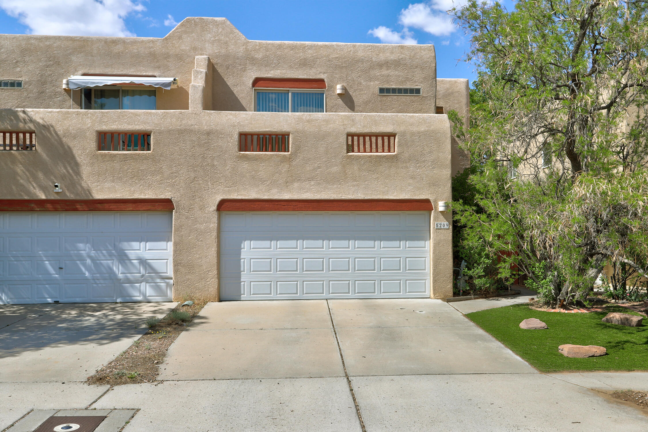 Where can you find such a cute townhome located in great area near shopping, restaurants and easy access to freeway for under $300K?   3 nice-sized bedrooms 1 full bath, one 3/4 bath and also a half bath for guests.   Seller has replaced all flooring!  No carpet!  There is Bamboo flooring in bedrooms and wood and tile downstairs.   Kitchen is open the the dining area and great room with cozy fireplace.  A separate laundry area and 2-car attached garage round out this wonderful home.  Easy care front and back yards.  Seller recently installed artificial turf in both f & B yards. Don't wait to schedule your tour to see this property!