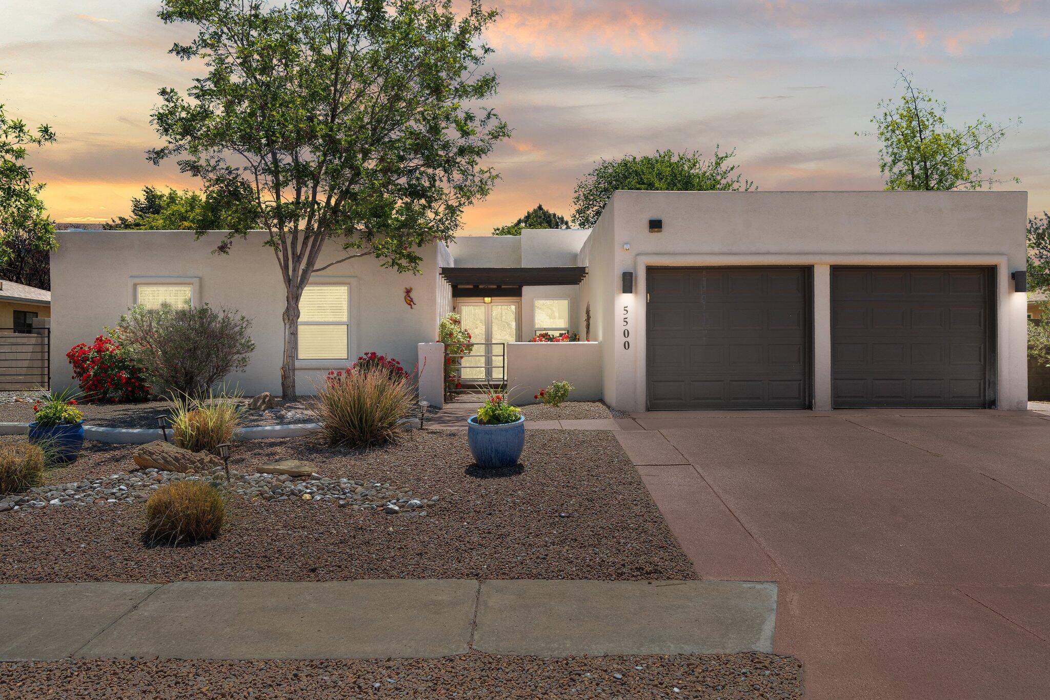 Come explore this beautiful home in the La Vista Grande neighborhood. The spacious living area features soaring ceilings and a striking fireplace with a tile surround. Elegant  walkways connect each room, including a generously sized family room ideal for gatherings, movie nights, or creating your perfect entertainment space. The kitchen offers granite countertops, rich cabinetry, and a charming breakfast nook. Both bathrooms feature granite counters and tile showers. Outside, you'll find a large open patio and terraced landscaping--perfect for entertaining or relaxing. This home also includes owned solar panels,