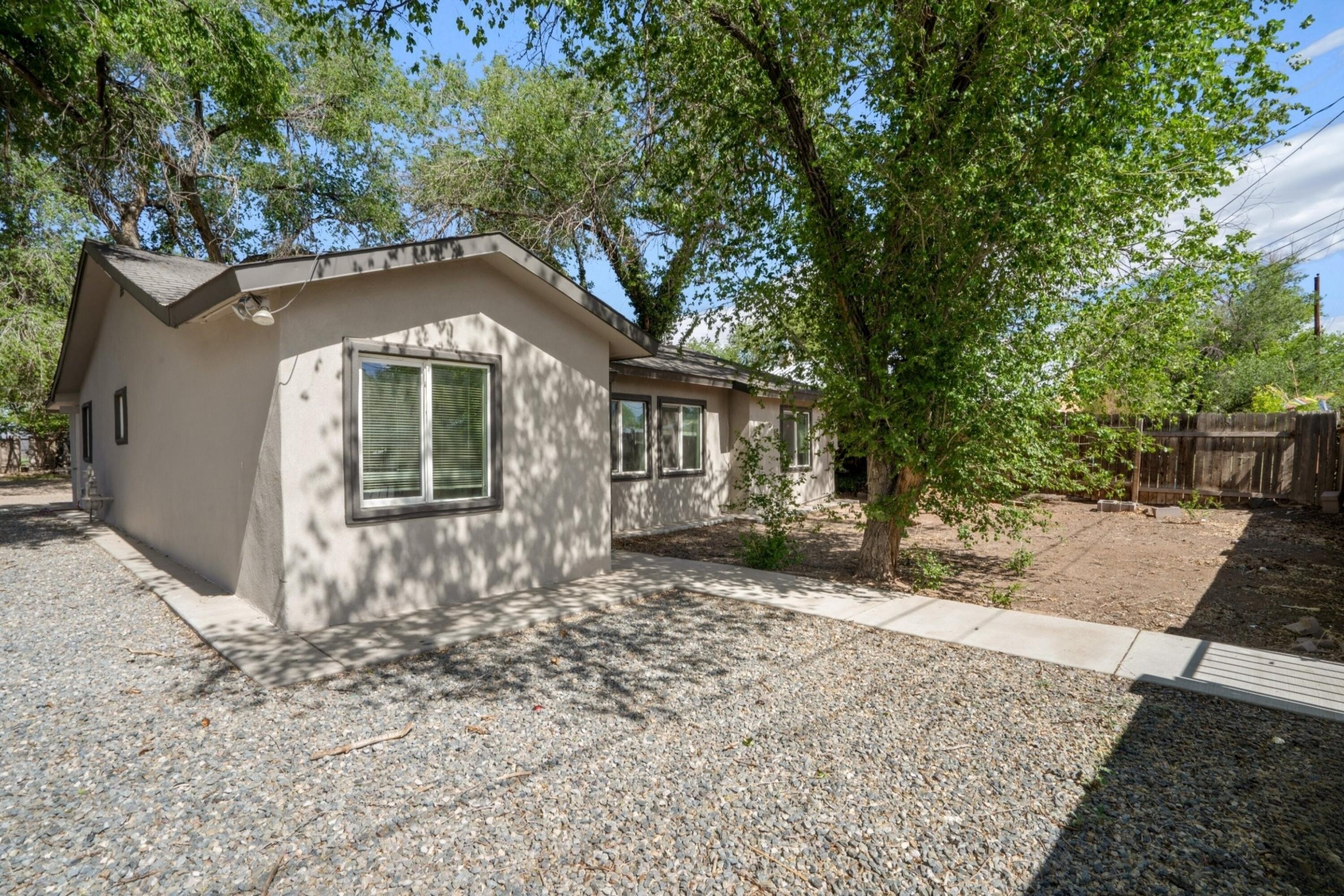 This unique property features a spacious 4-bedroom, 2-bath main home with 1,329 sq ft of living space and an unfinished casita, all situated on a generous 0.28-acre lot. The main home boasts modern conveniences like refrigerated A/C, upgraded bathrooms and windows, offering comfort and style. The unfinished casita presents endless potential--convert it into a guest house, studio, or rental unit. Don't miss this incredible opportunity to maximize your investment!