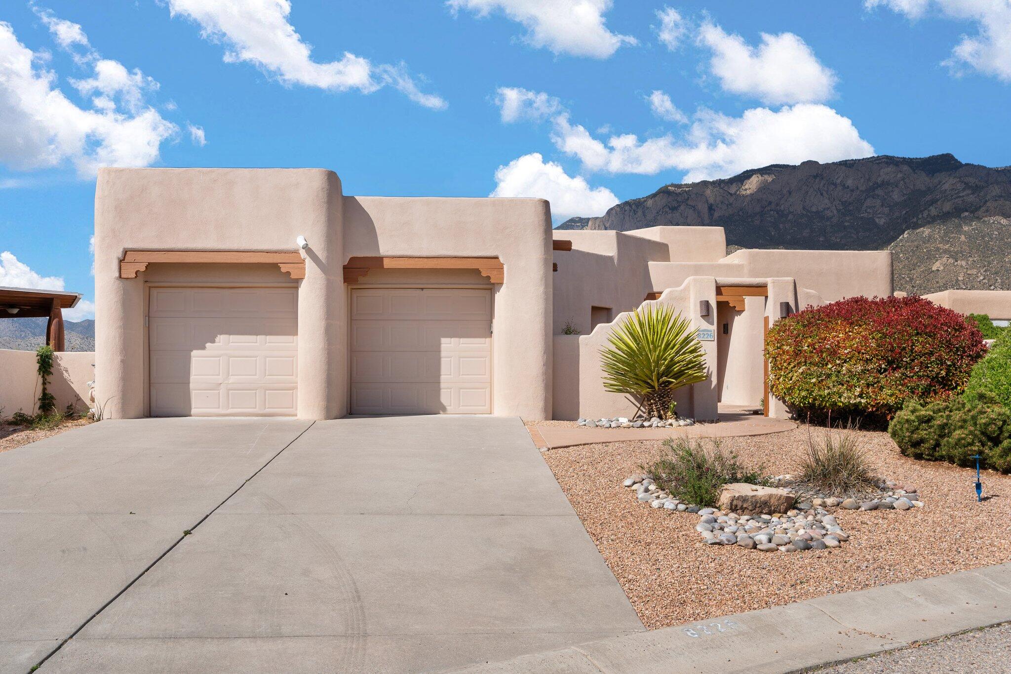 Freshly painted One Story, Large back patio with views.  Open floor plan bright Radiant heat. Beamed Ceiling southwest accents including Adobe wall Nichos, Beamed 11 ft Ceilings, Front and back patios Walled with privacy and outdoor lighting.   Close to Littler Cloud park and access to trails.  including the Albuquerque Activity Loop.
