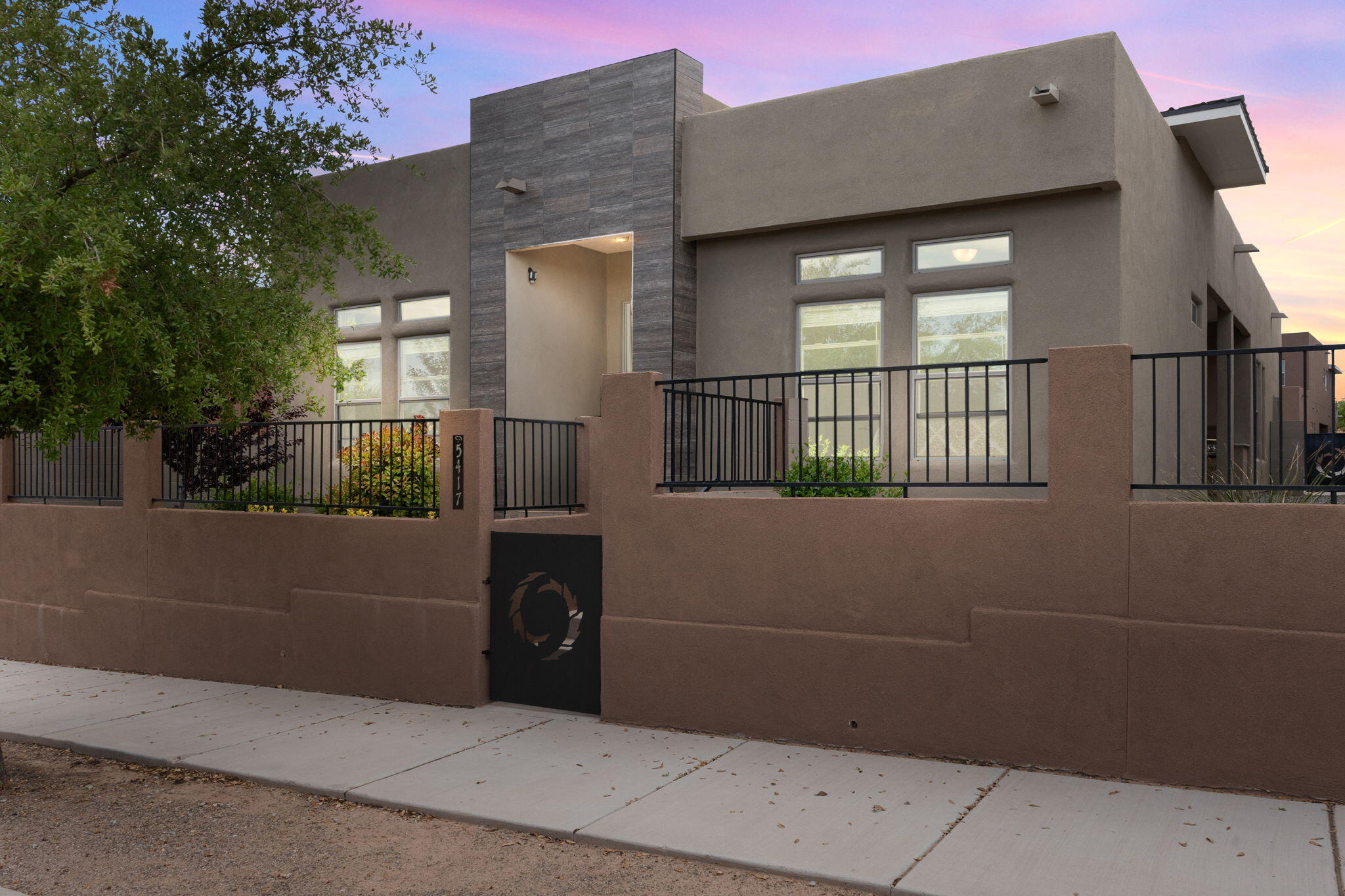 Discover modern elegance in this impressive single-story home by Twilight Homes, nestled in the desirable Mariposa community. Boasting 1,804 square feet of well-designed living space, this gem features 3 spacious bedrooms and 3 full bathrooms. Open-concept floor plan filled with natural light and elevated by beautiful wood-look tile flooring that flows seamlessly throughout the main living spaces. Chefs kitchen with upgraded cabinetry,  granite countertops, backsplash, stainless steel built-in oven/microwave, gas cooktop, refrigerator, pantry and a kitchen island with seating space. Private owner's suite is a true retreat. The en-suite bath is thoughtfully designed with dual sinks, a luxurious soaker tub & walk-in shower. Patio with a built-in grill! Clubhouse, pool, trails and more!