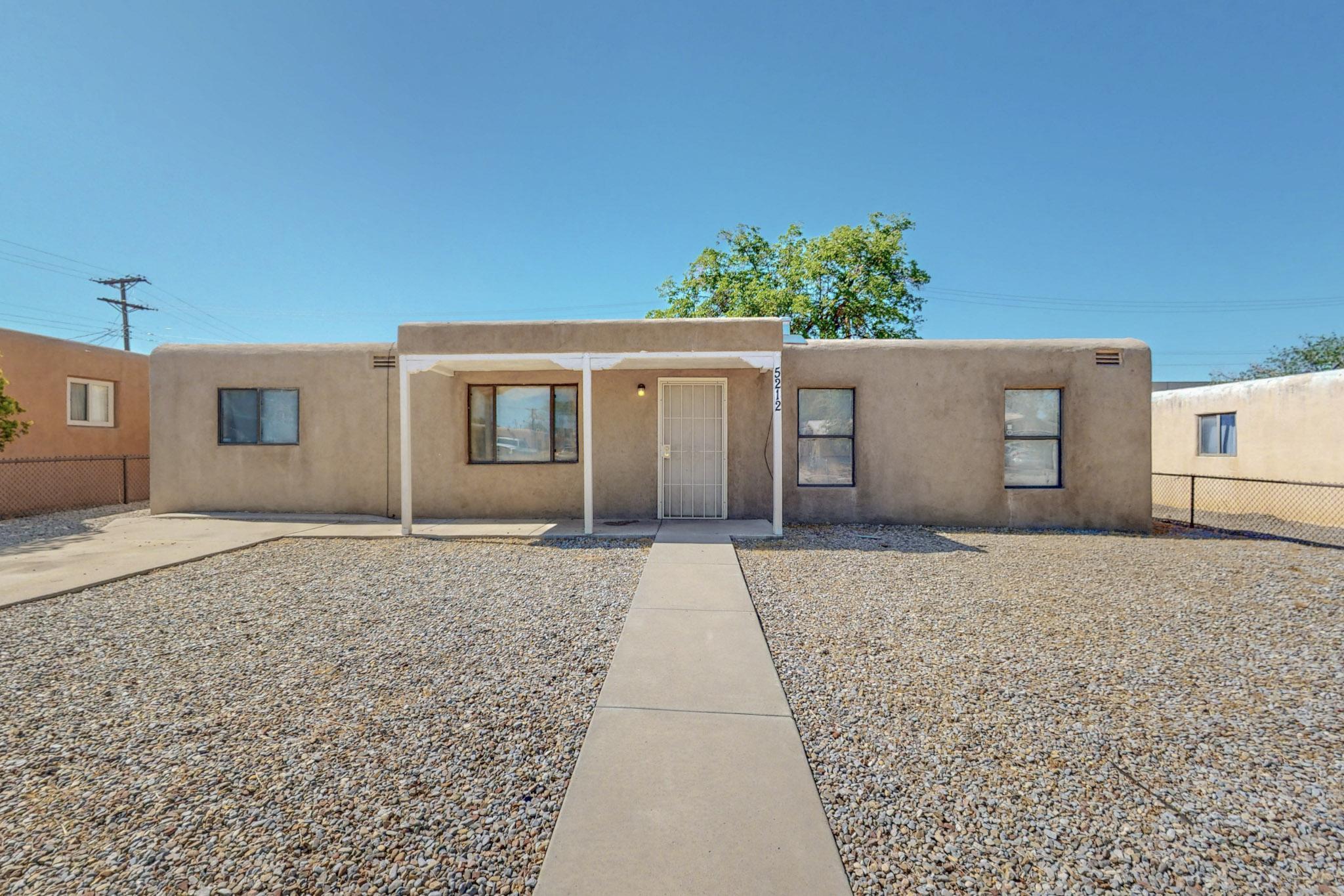 Welcome home to this hidden gem in Albuquerque's desirable and convenient NE Heights neighborhood. This home features an open dining area with an added on spacious living area, freshly painted walls throughout and a backyard for you to transform into your own personal oasis! Move in ready and also Perfect for any buyer looking to add value and personalize their home with their own personal touch. Location on this is great as well! Close proximity to parks, shopping, restaurants, schools and trails!