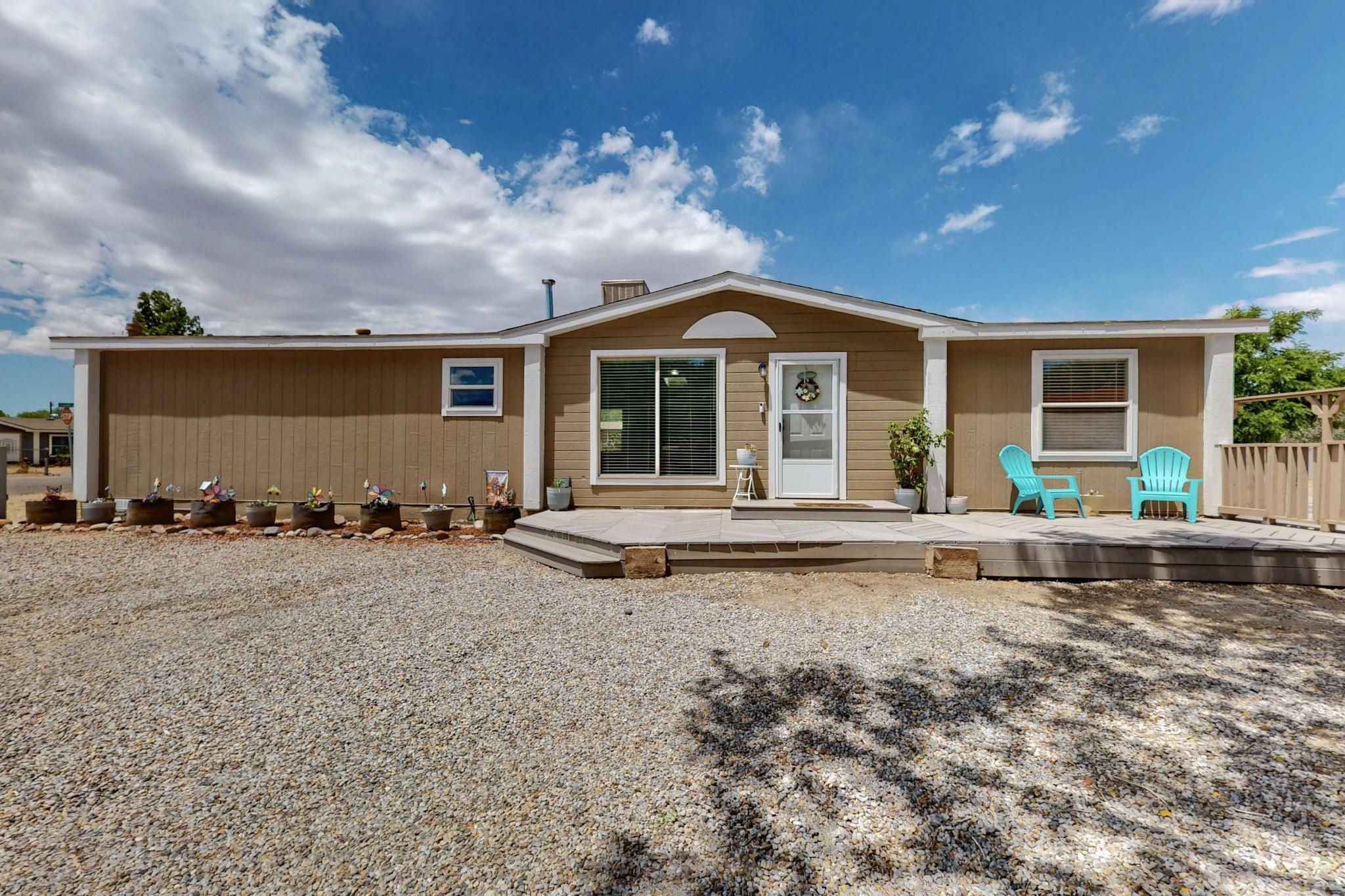 Open House Sat 5/17 12-2pm. Charming 3-Bedroom Home in the Heart of Bernalillo - Move-In Ready & Full of Possibilities! Discover comfort, style, and space in this charming 3-bedroom, 2-bath home, nestled on over 1/3 of an acre in the heart of Bernalillo. This lovingly cared-for home combines modern upgrades with room to grow--perfect for those looking for both convenience and opportunity. Step inside to find a bright, inviting interior with contemporary finishes. The roof, windows, furnace, plumbing, and electrical were all upgraded in 2021, giving you peace of mind. Enjoy the expansive backyard with a deck perfect for entertaining, plus a concrete pad already in place--ideal for a future garage, workshop, or studio. With backyard access and plenty of space, the possibilities are wide open.