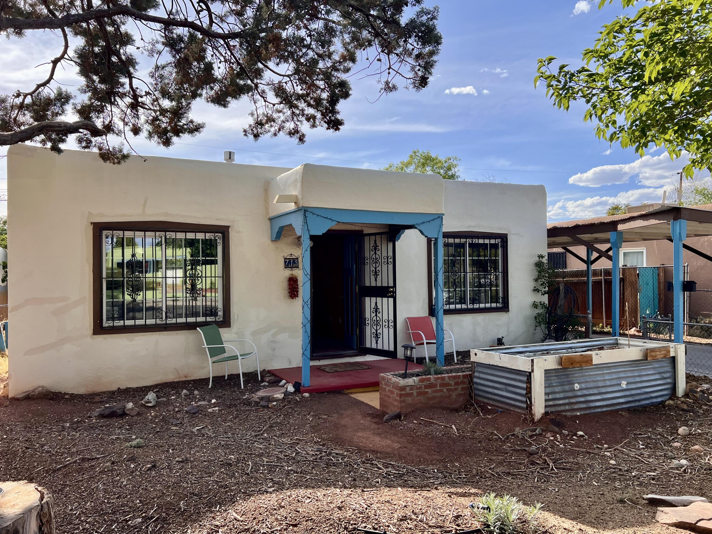 Charming 2-bedroom, 1-bath home nestled in the heart of Albuquerque's Victory Hills neighborhood. Built in 1947, this 985 sq ft residence boasts beautiful hardwood floors, a fully remodeled bathroom, refrigerated air, and a cozy ambiance throughout. The spacious lot offers a covered patio, perfect for relaxing or entertaining. Located just minutes from UNM and Nob Hill, enjoy the convenience of nearby shops, dining, and parks. With its blend of vintage charm and modern updates, this home is a true gem in a sought-after location. Don't miss the opportunity to make it yours!