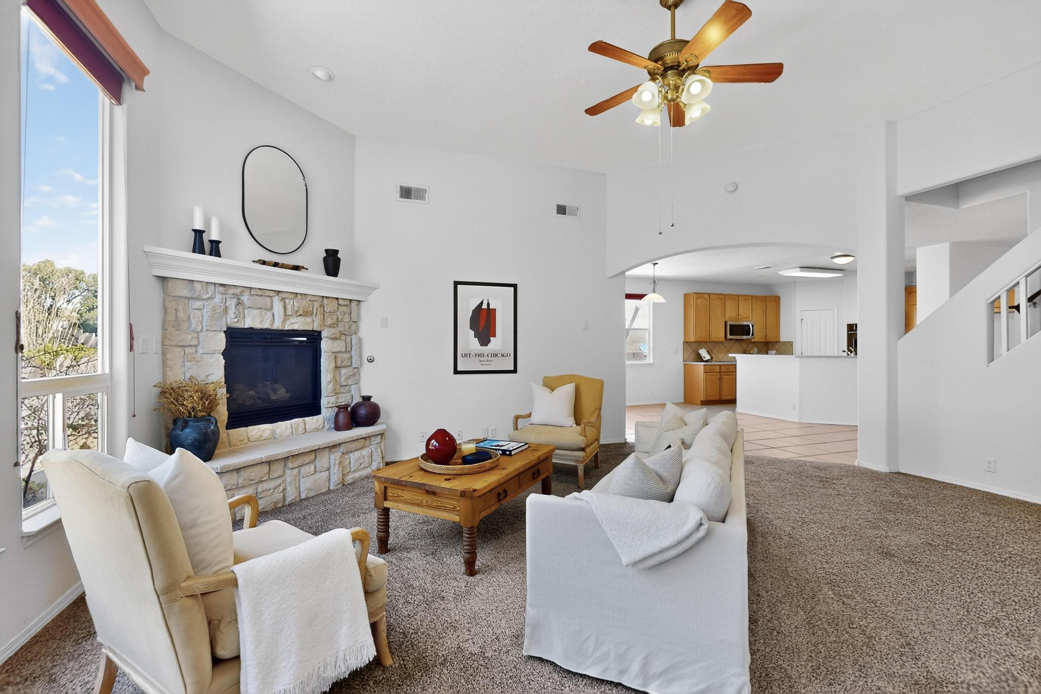 IMPROVED PRICE! This well-loved one owner Centex Designer series home is situated on a large lot close to shopping & amenities. Featuring brand new carpeting, it is has been upgraded with newer HVAC units (2023 & 2024) + a TPO roof. The formal dining room off the foyer has warm wood floors and could serve as an office. The open kitchen has solid surface counters; tall maple cabinets, double ovens & newer S/S dishwasher. The bright & airy Great Room has tall ceilings & corner fireplace & is wired for surround sound.  The spacious primary bedroom with gas fireplace is conveniently located on the lower floor. The bonus room upstairs could be a 4th bedroom. HUGE under-stair storage. Solar panels keep your utility bills low. The massive 3 car garage can accommodate an extended cab truck.
