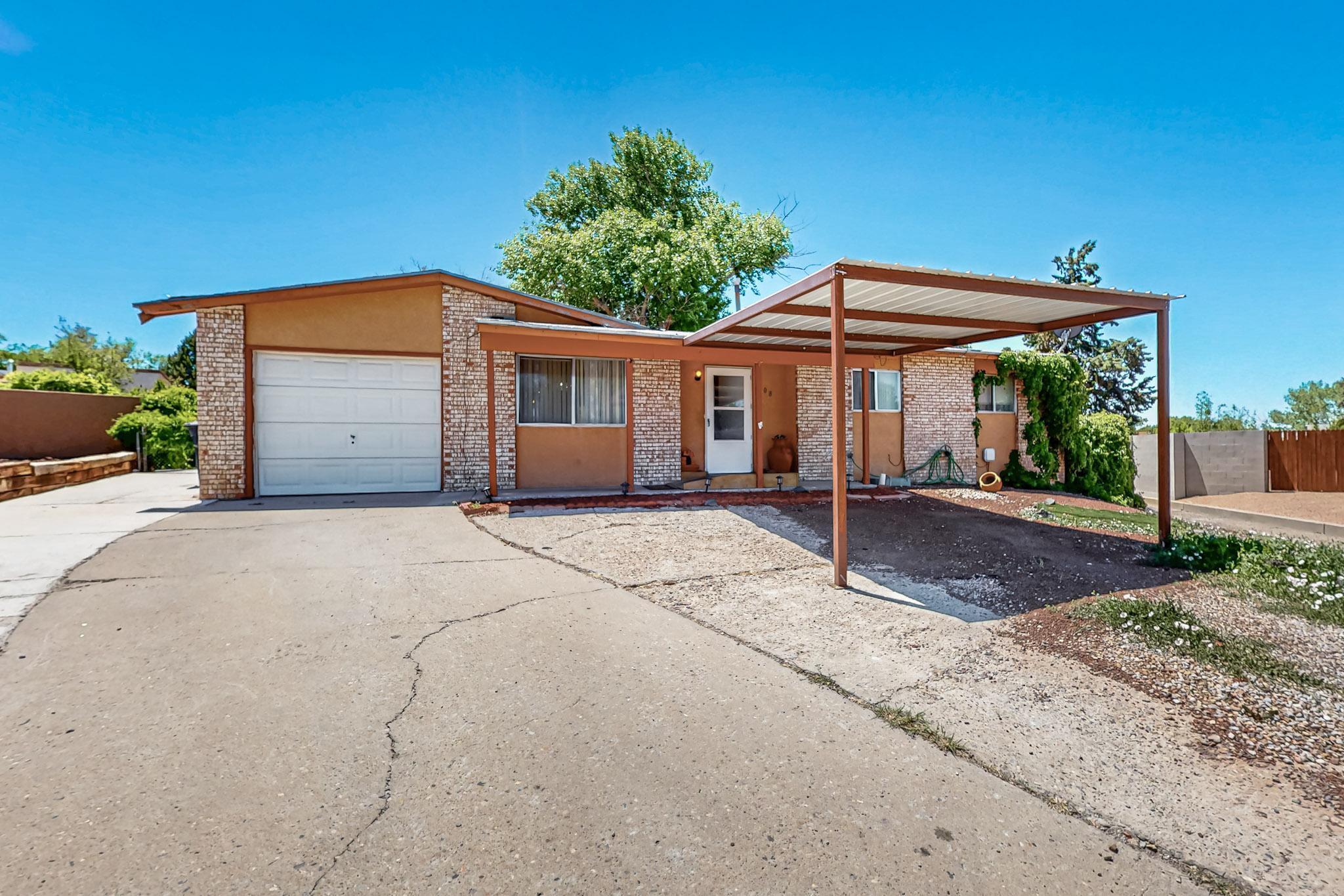 Great home value in the NE in a Cul-de-sac! House has been freshly painted, kitchen island with granite countertops, baths have been conditioned for handicap accessibility. House has no carpet, and it is located in a quiet neighborhood.  Enjoy the very large backyard with paved entrance! Cover patio for entertainment and family gatherings! Come & view it now! DO NOT MISS THIS OPPORTUNITY!