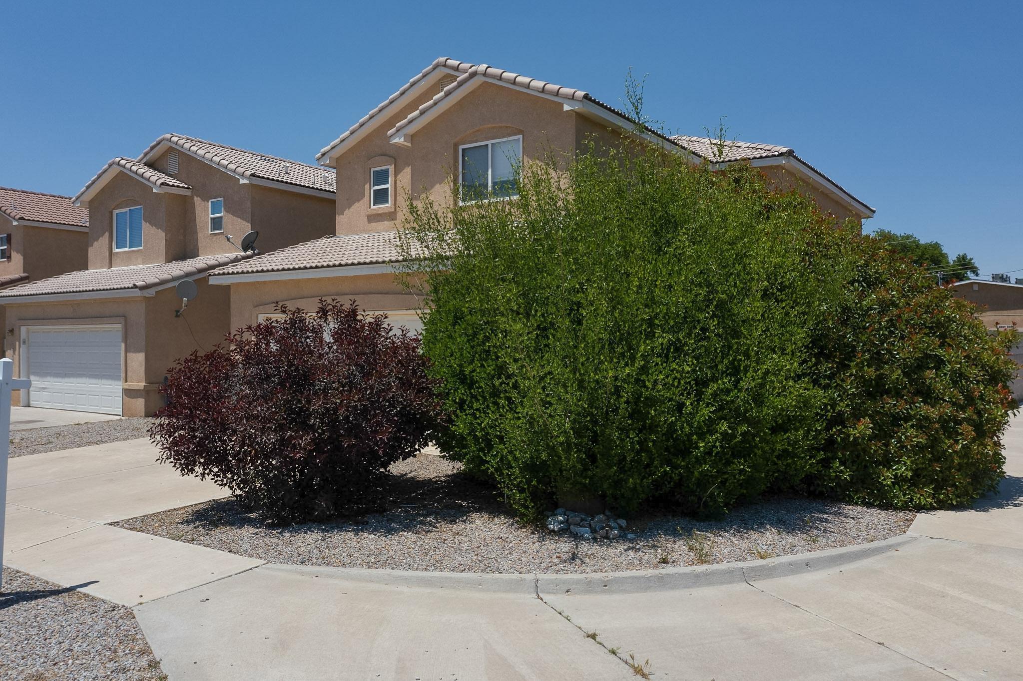 Located in the tranquil Vista Magnifica neighborhood perched on a bluff above the river, this home offers truly magnificent views of the Sandias, downtown, and the bosque--especially from the second-story primary suite. This beautiful, spacious home  is clean, bright, and situated on a quiet corner lot with no thru-traffic,. Move-in-ready, your new home features an open floor plan, neutral paint, and tile flooring downstairs. With 3 bedrooms plus a loft--ideal for a home office or playroom--there's space for everyone. Enjoy a finished garage, a mature, landscaped front yard, and a private backyard with a high wall, large patio, and garden area--perfect for entertaining or relaxing outdoors.
