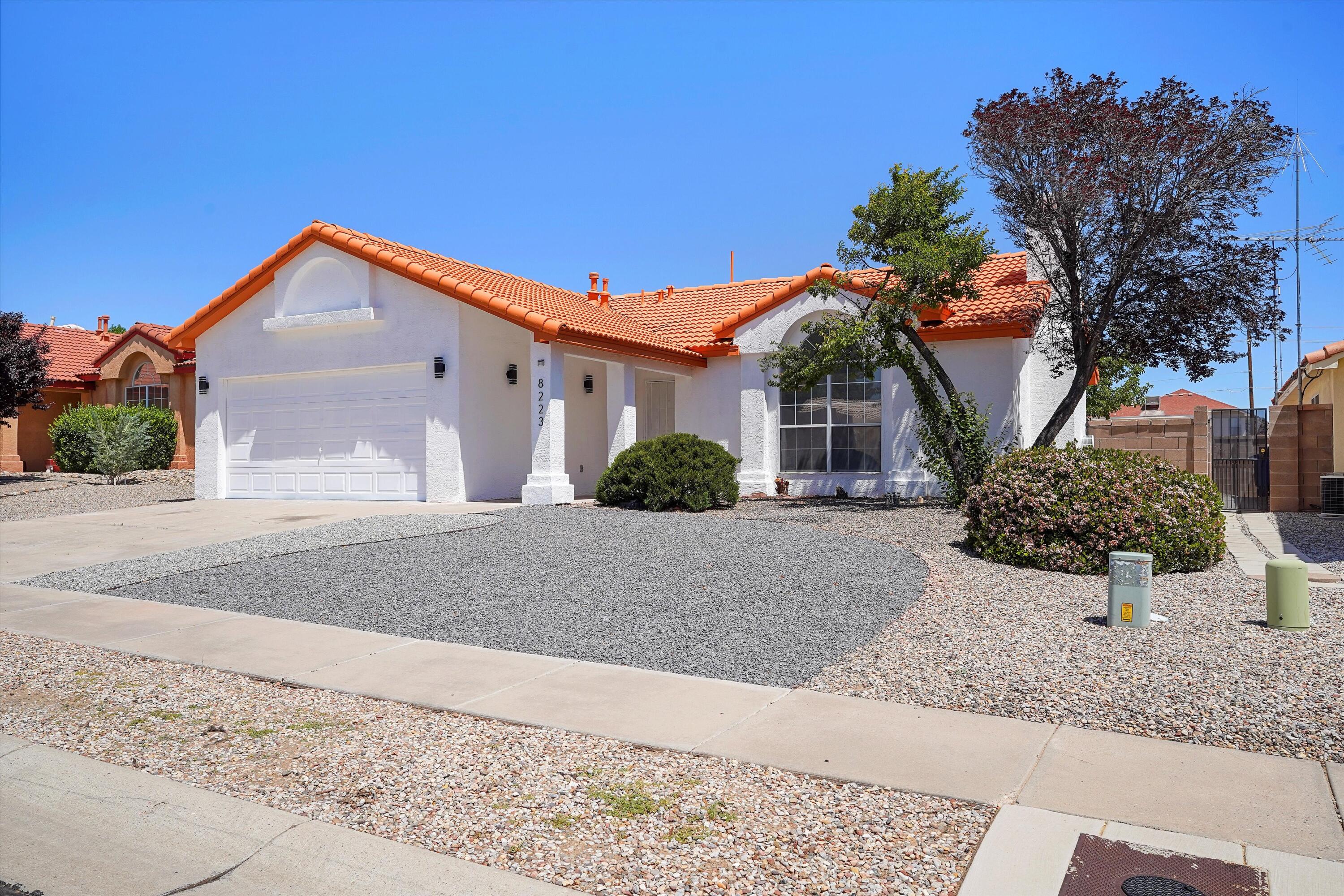 Must See!This beautifully remodeled 3-bedroom,2-bathroom home is move-in ready and full of recent upgrades. Updates include stucco repair, fresh interior and exterior paint, and new tile flooring throughout--no carpet! The updated bathrooms feature modern finishes, the master suite offers a spacious layout with two separate single-sink vanities and dual walk-in closets, providing individual space and privacy.The kitchen has been refreshed with new countertops, all-new fixtures, and comes complete with brand-new appliances. A finished garage. Conveniently located near coffee shops, breweries, restaurants, grocery stores, gas stations, and easy access to I-40 this home combines comfort, style, and convenience.