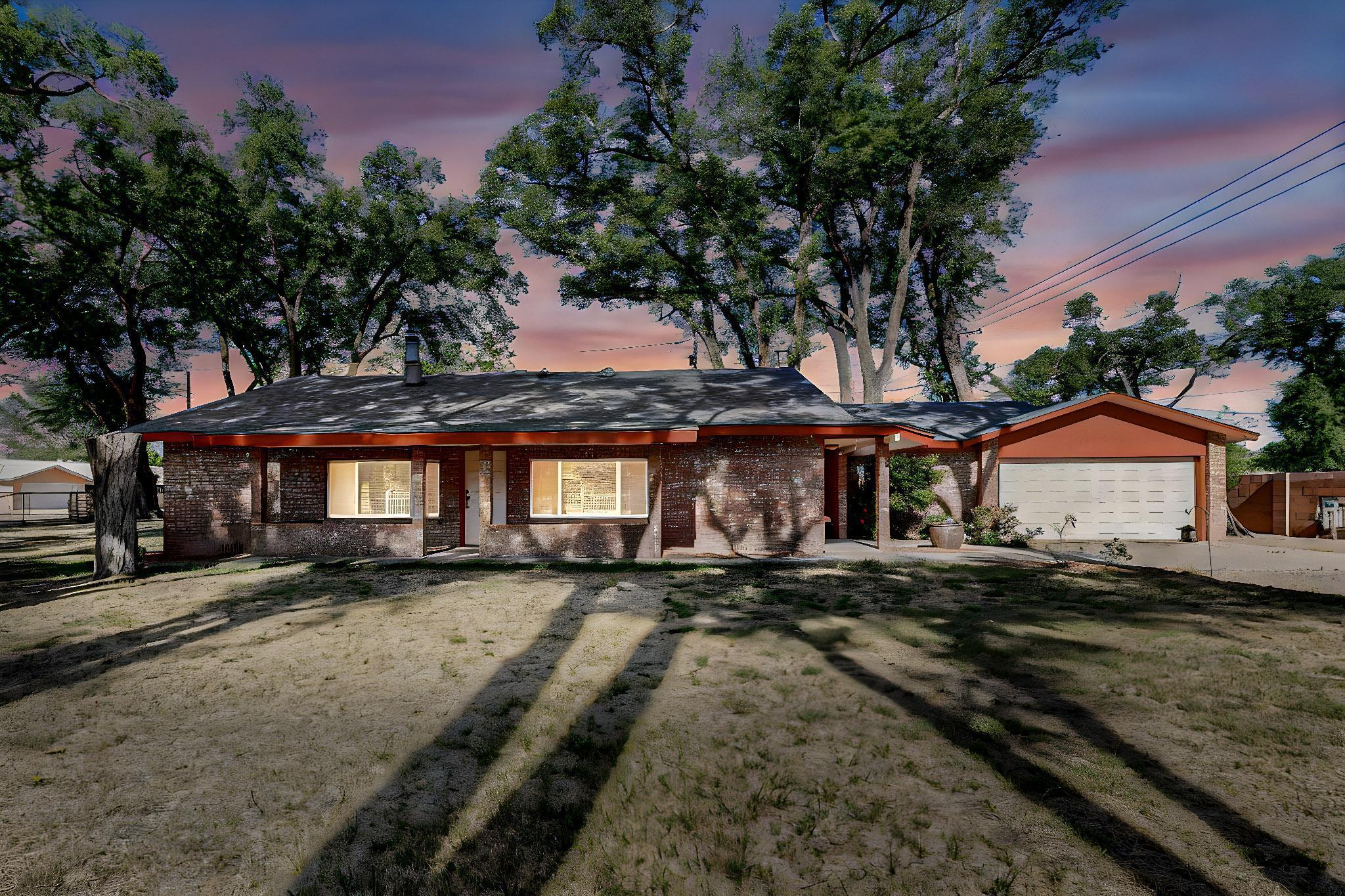 Warmth and beauty are the words that come to mind when you step onto this 1 acre property. Notice the low maintenance brick veneer exterior, highlighted by the lovely green of the surrounding lawn, and mature trees. You'll find ample room within this 4 possible 5 bedroom oasis, with the 5th bedroom functioning as an office/study. Find 3 updated Baths, and a nicely updated kitchen which features hard surface countertops, updated appliances, and recessed lighting. Your inner chef will revel in the possibilities afforded by the exceptionally large pantry! Gleaming oak floors, and the  understated custom wood burning fireplace will inspire your decor, as you make this open design house your home. Finally, there's a delightful surprise awaiting... a second primary BR Ensuite! Come and see!