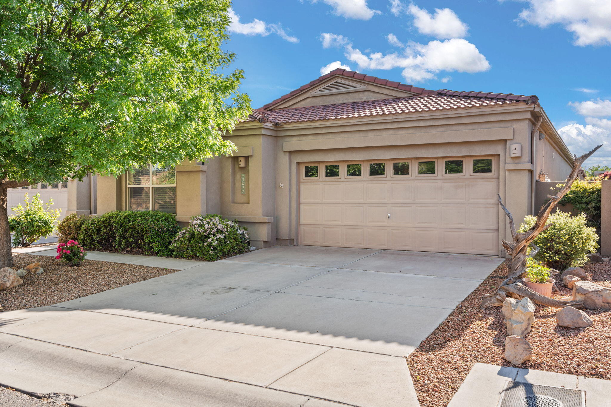 Move-in ready Charter-built gem in the gated Enclave at Oxbow! This single-story 3 bed, 2 bath home features newer tile in the bathrooms, quartz kitchen countertops, and NO KITEC PLUMBING (2018). Enjoy easy living with luxury vinyl and tile flooring throughout--no carpet! The oversized 2-car garage adds extra storage. Recent upgrades include a water heater (2023). Nestled in a beautifully landscaped community with trails, and just minutes from I-40, shopping, and dining. This well-maintained home won't last--schedule your tour today!